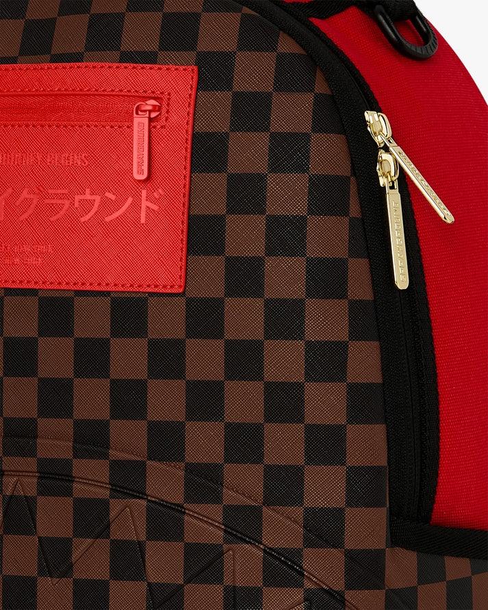 Zaino moda uomo donna fantasia quadri marrone e nero, dettagli rossi e zip dorate