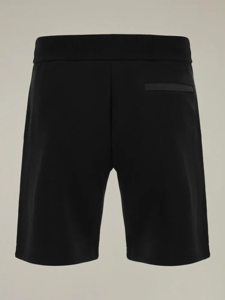 Bermuda uomo nero cotone vista posteriore con tasca a filetto, stile casual elegante