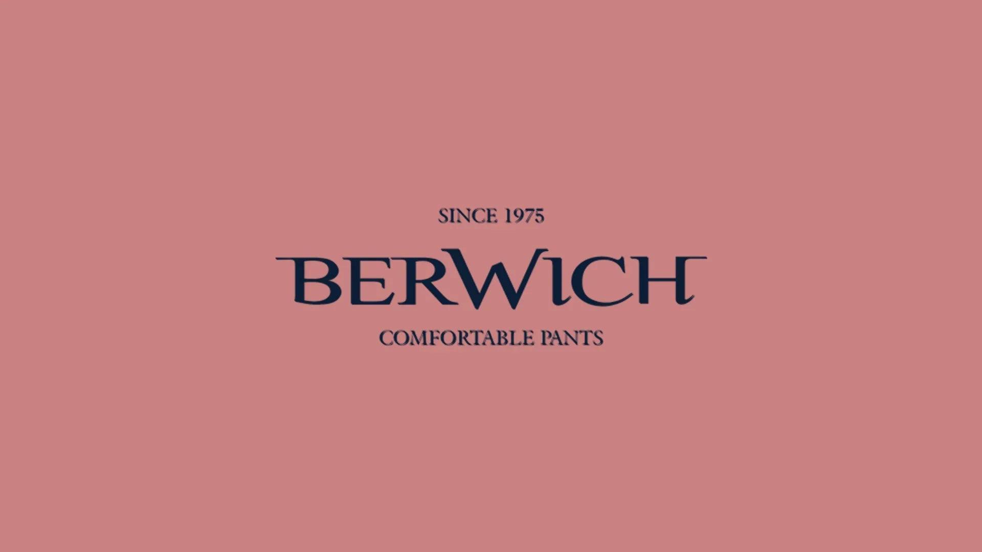Logo Berwich su sfondo rosa, testo 'Comfortable Pants since 1975', moda uomo donna.