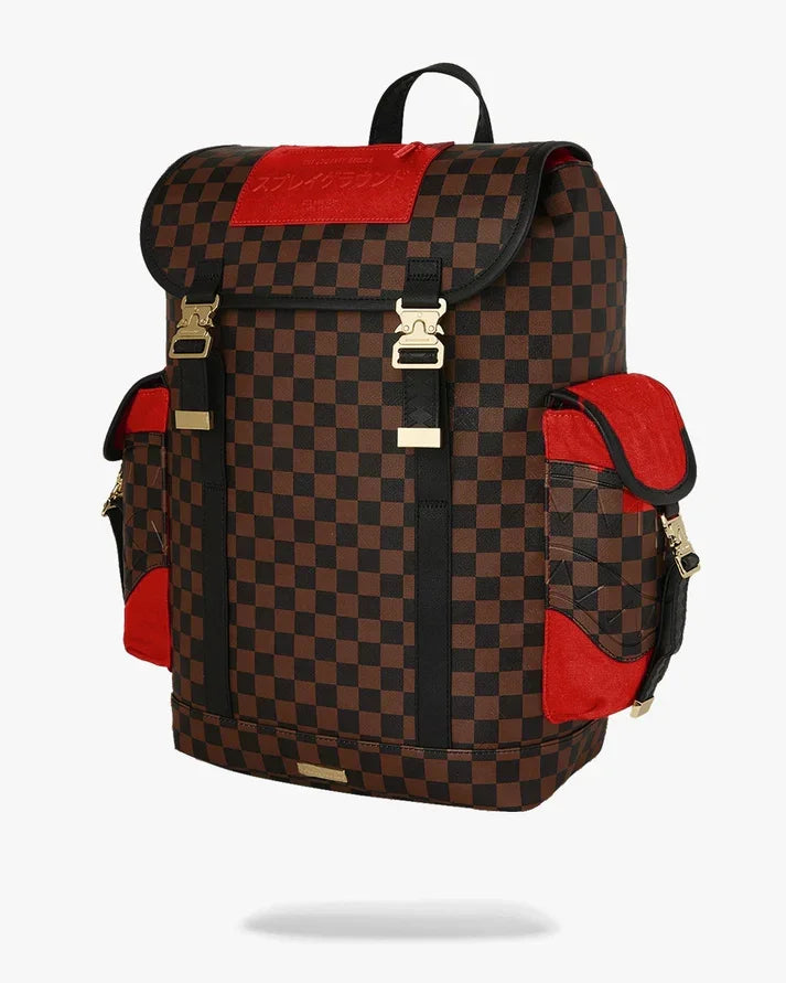 Zaino uomo quadrettato marrone e nero con dettagli rossi e fibbie dorate, stile moderno