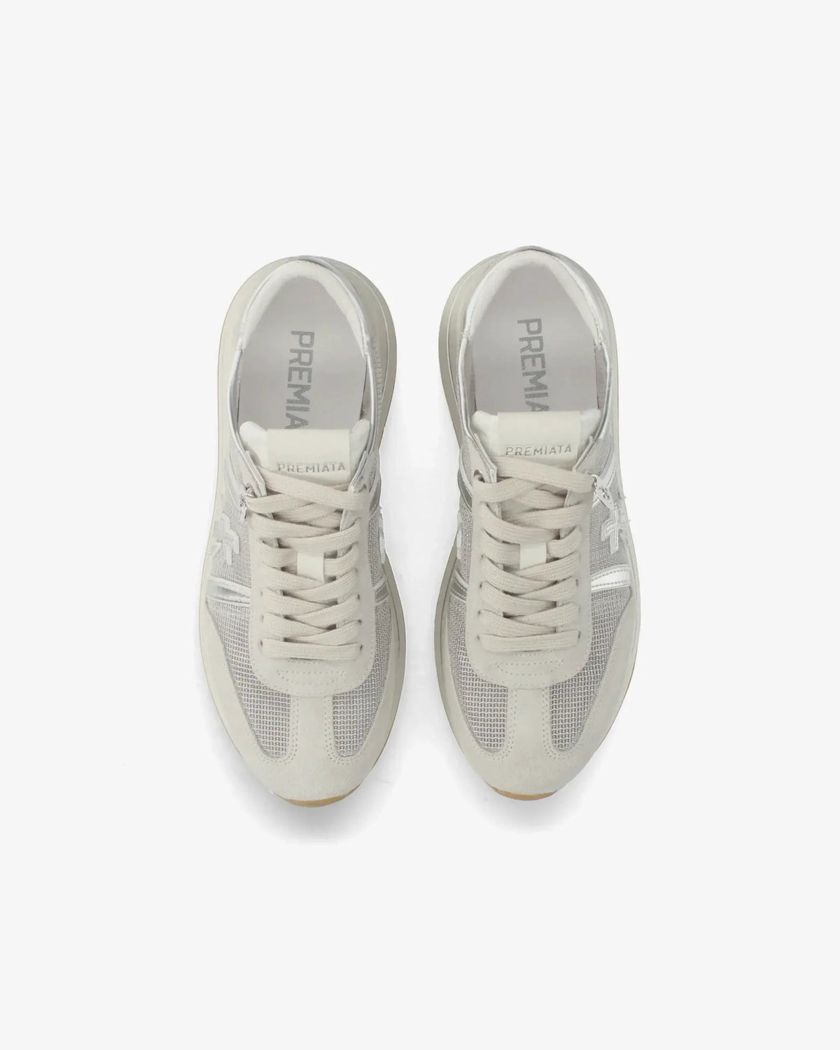 Sneakers uomo Premiata beige in pelle e tessuto vista dall'alto, design moderno ed elegante.