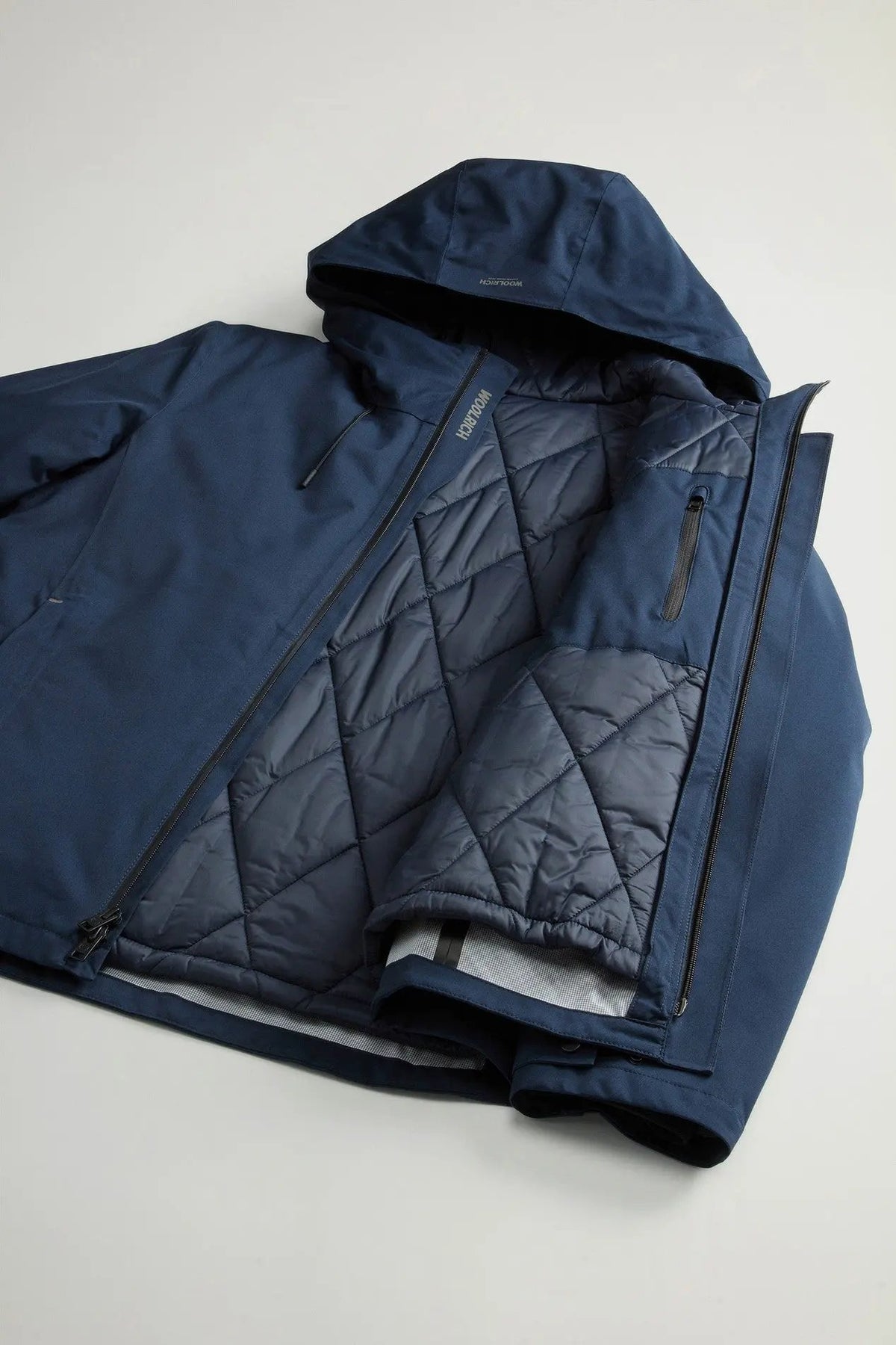 Giacca Woolrich Crestmont 3 in 1 Melton Blue - Dettaglio zip frontale e patta protettiva
