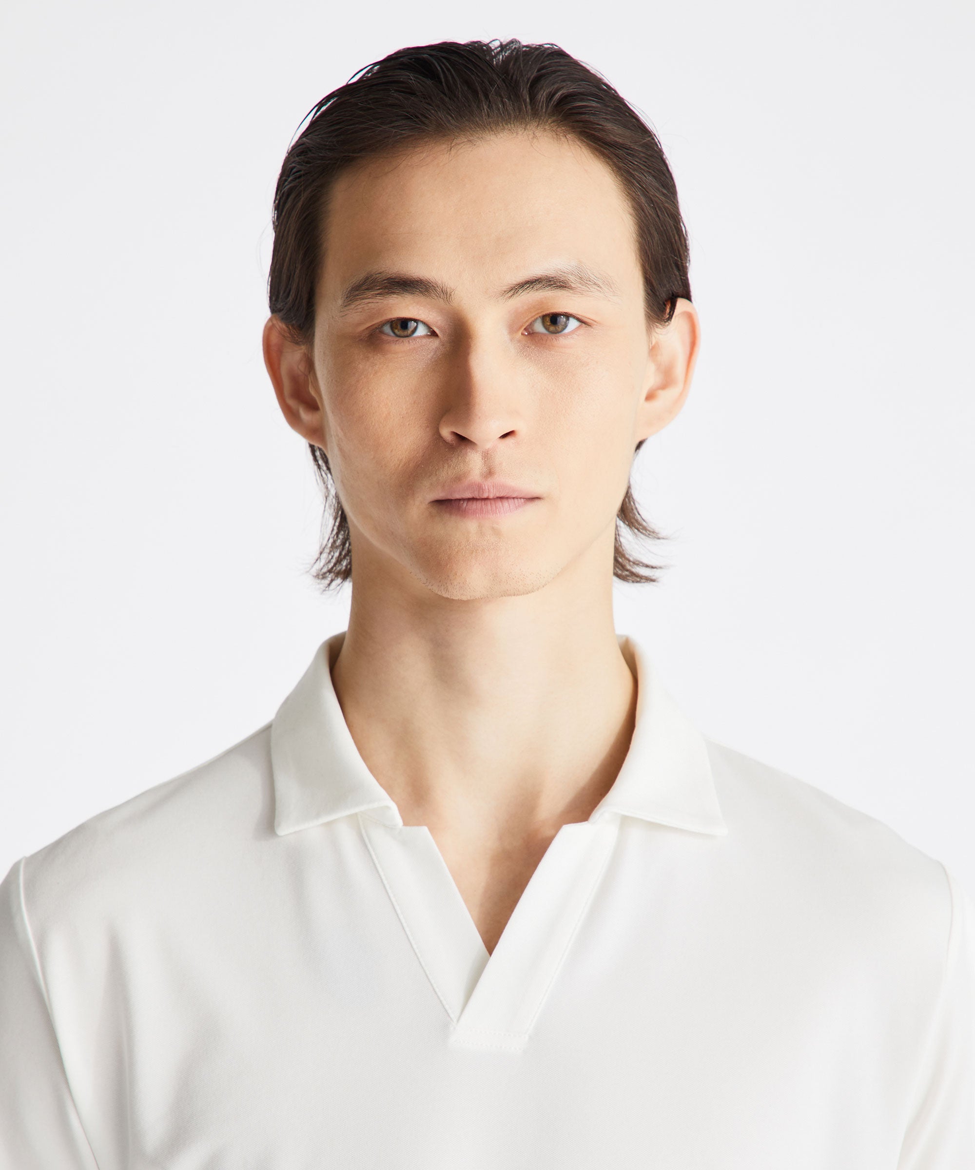 Camicia polo PEUTEREY New Helgo con collo classico, tessuto morbido, colore bianco, vista frontale sul capo.