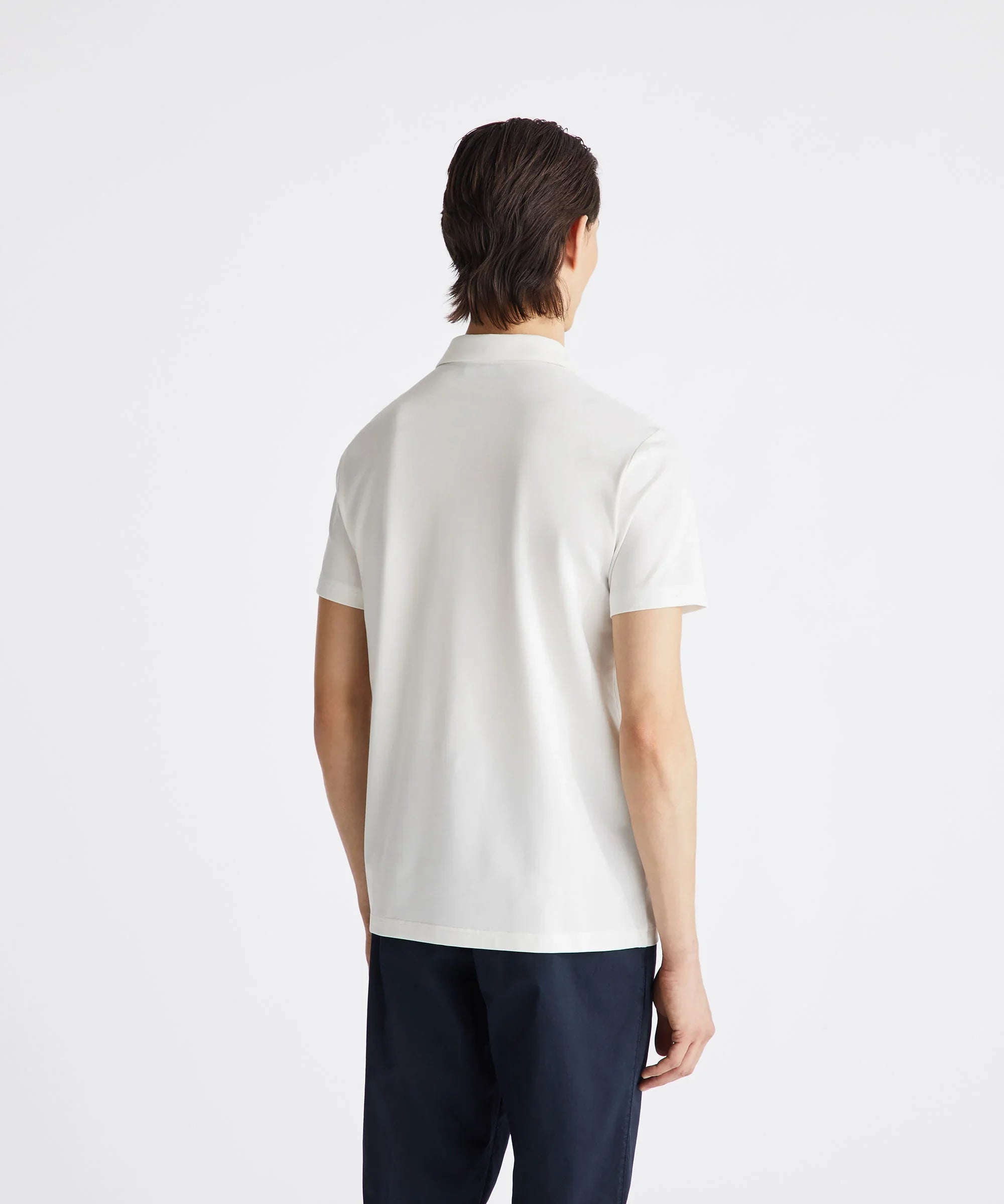 Maglietta polo bianca da uomo vista posteriore, abbigliamento casual elegante