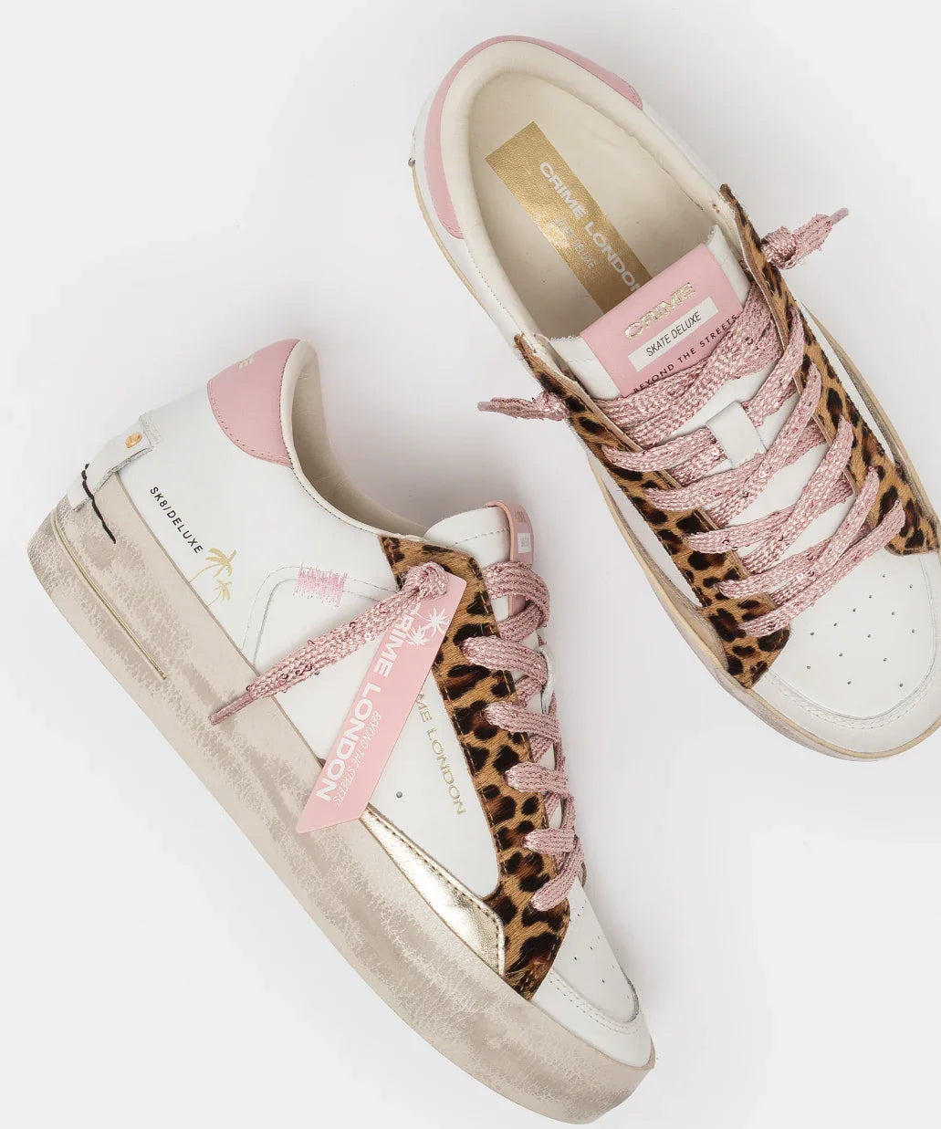 Sneakers donna bianche con dettagli rosa e animalier, stile casual moda primavera estate