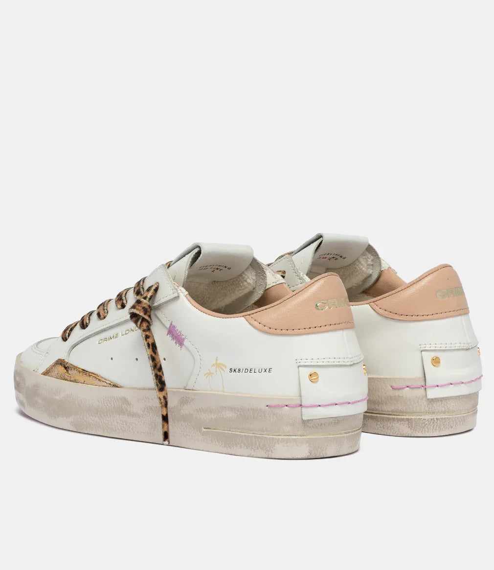 Sneakers donna bianche con dettagli beige, lacci leopardati, look urban fashion