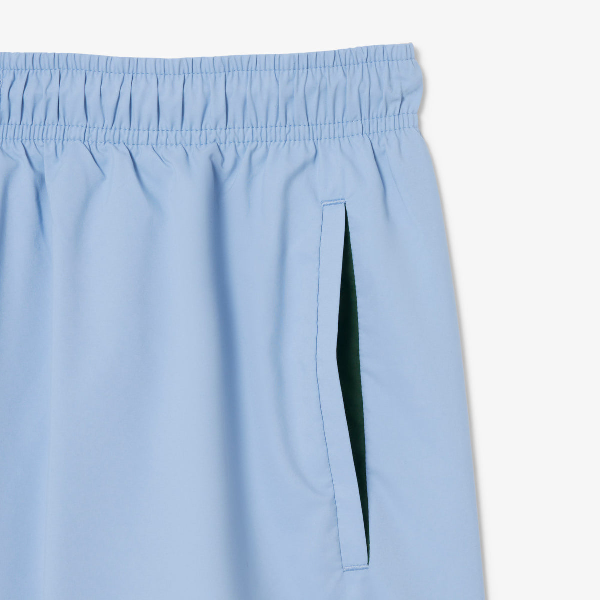 Costume da bagno quick-dry LACOSTE MH6270 38I con stampa blu e taglio sportivo, ideale per nuoto e attività acquatiche.