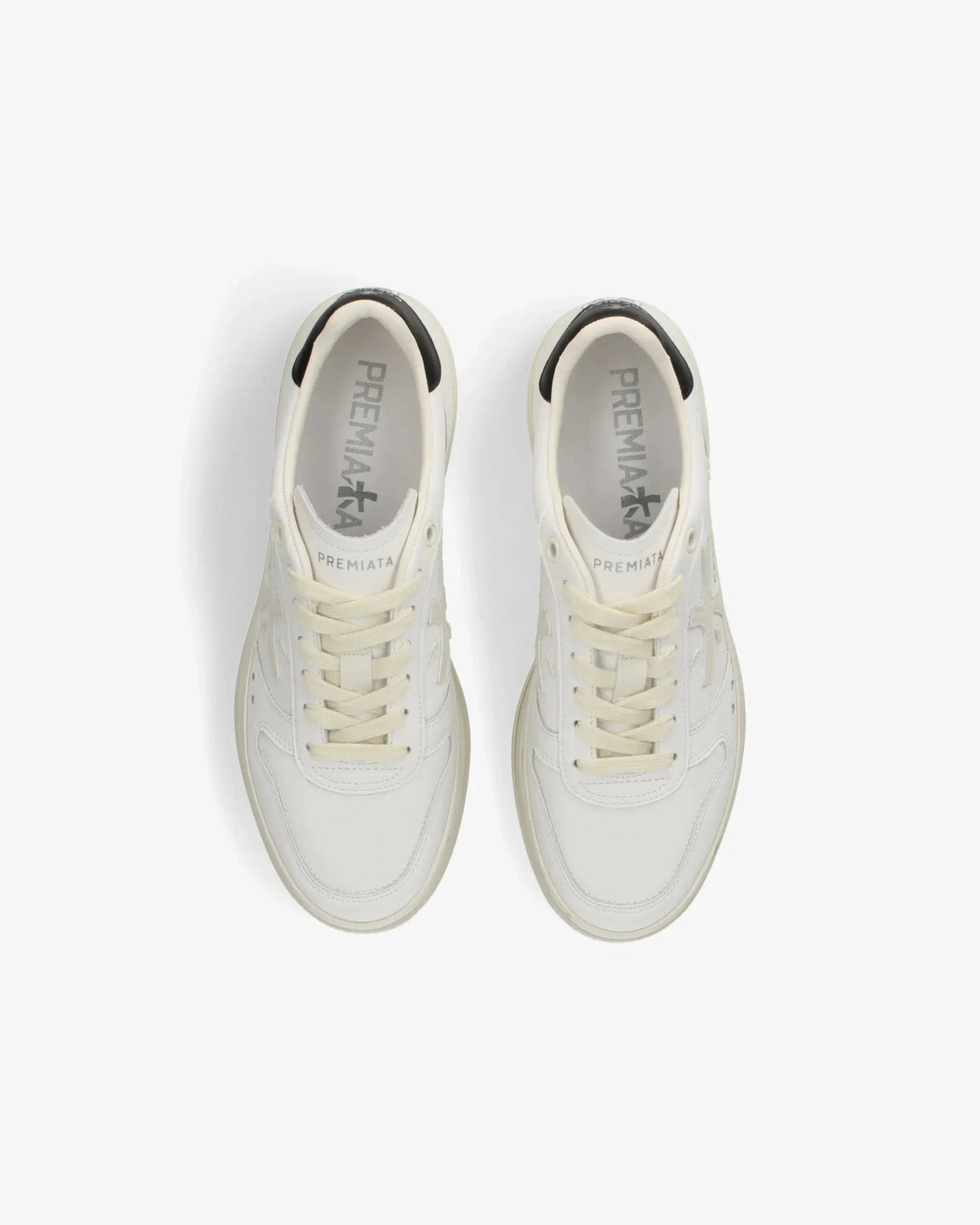Sneakers uomo bianche Premiata in pelle viste dall'alto, design minimalista e moderno