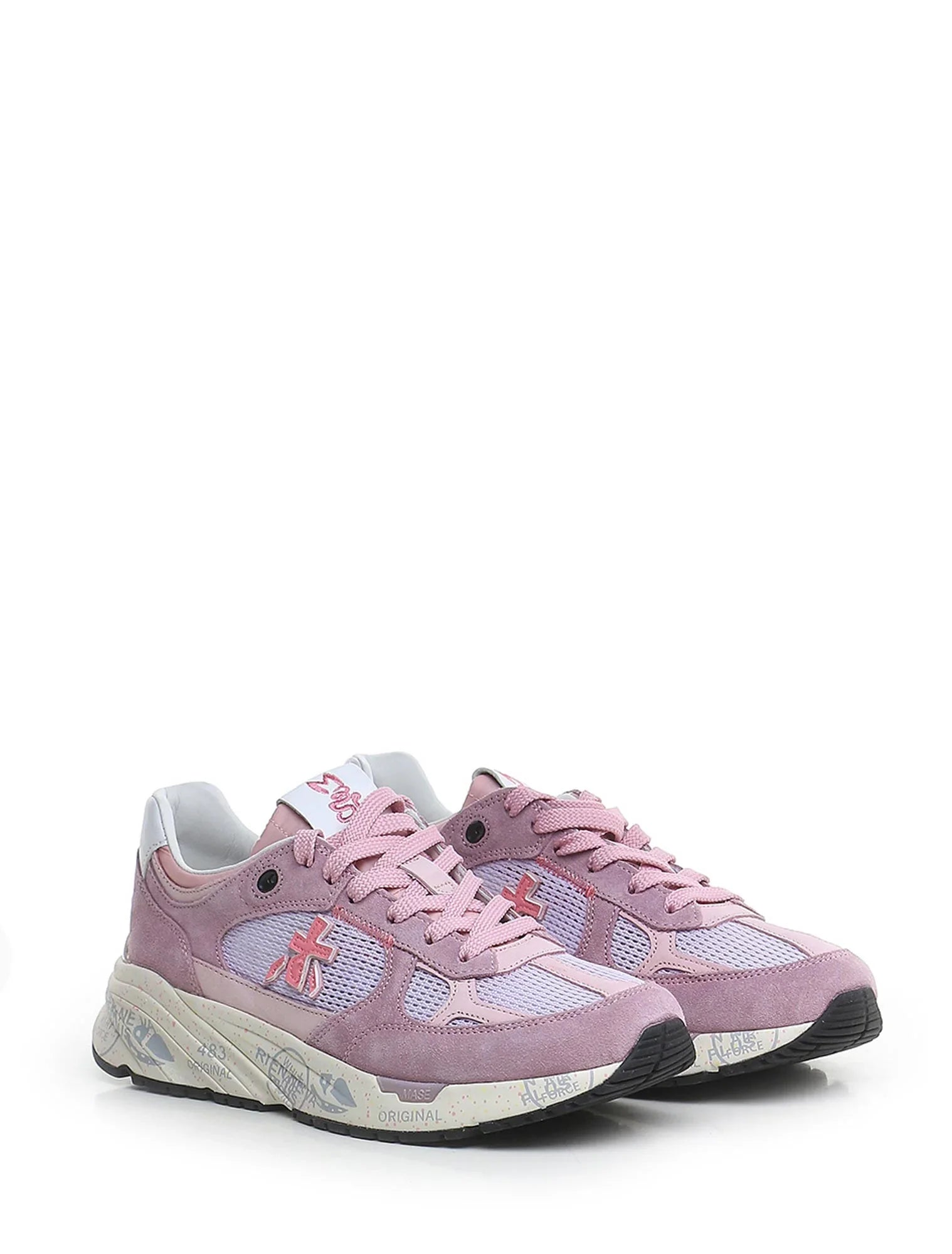 Sneakers da donna rosa in pelle e mesh con dettagli bianchi e suola chunky decorata.