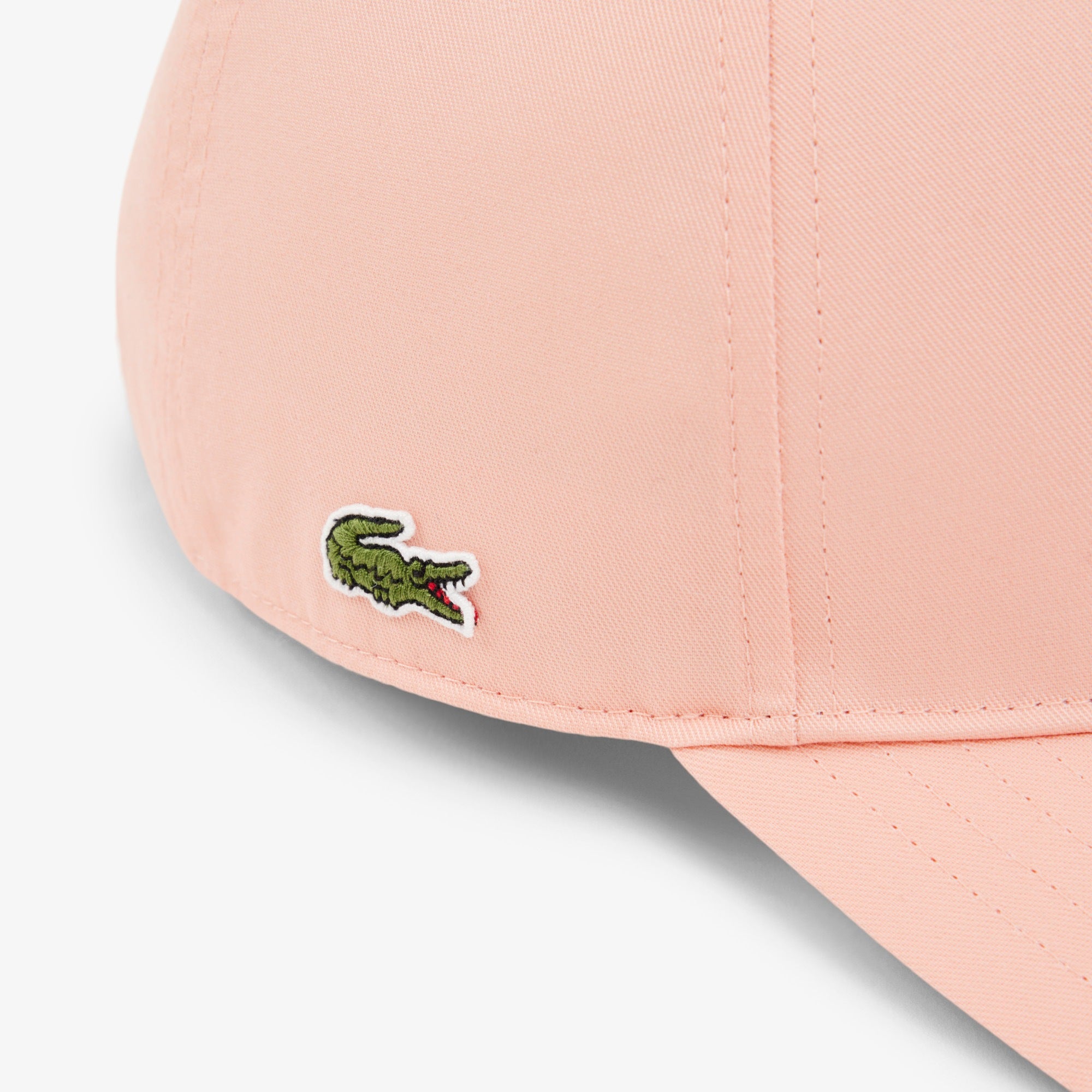 Cappellino da baseball LACOSTE RK0342 UI2 con ricamo 3D, stile sportivo e logo sulla fronte, in tessuto bianco e verde.