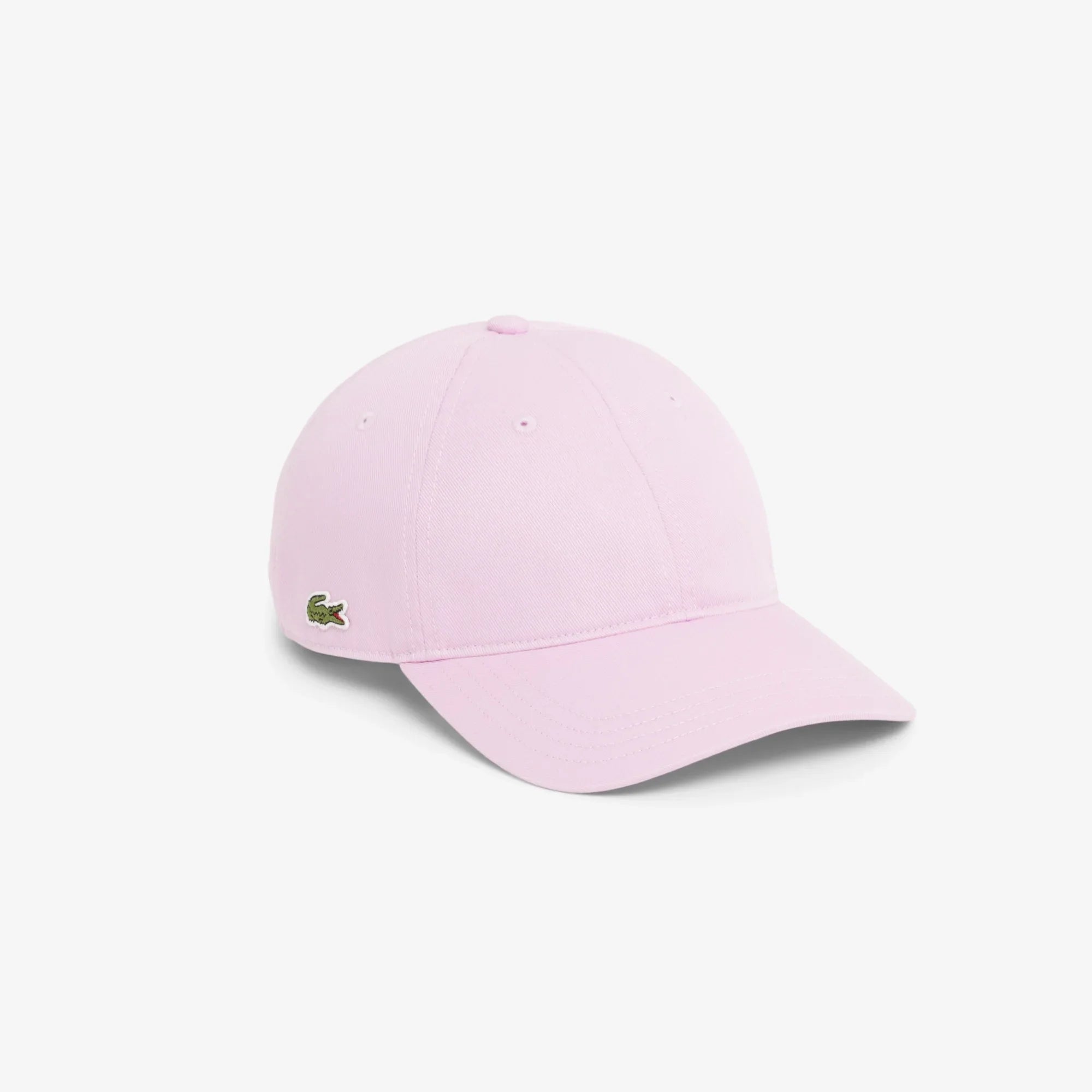 Cappellino da baseball rosa chiaro con visiera curva e piccolo logo ricamato laterale.