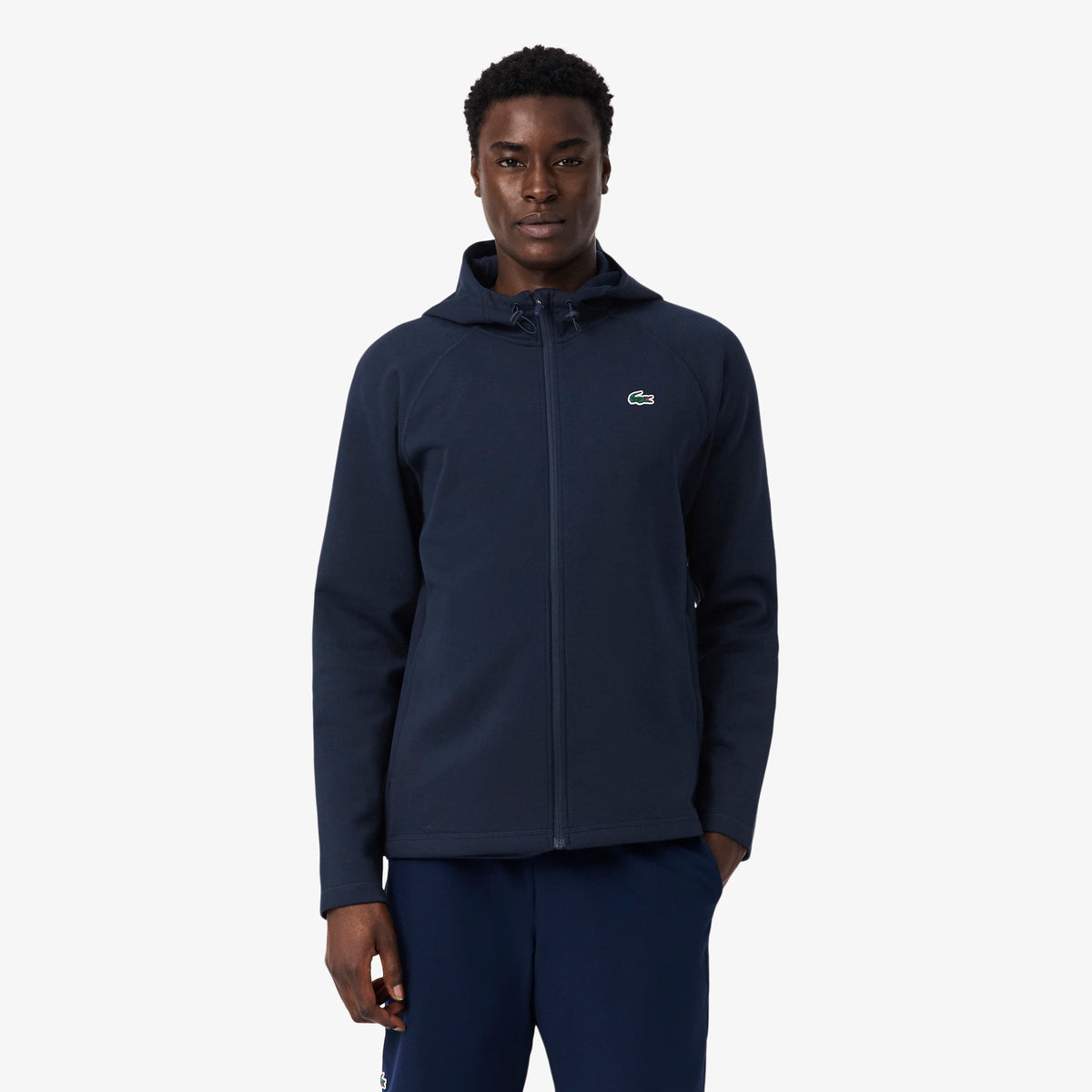 Felpa sportiva elasticizzata con cappuccio e zip LACOSTE SH0152 166, morbida e comoda, vista frontale con dettagli del cappuccio.