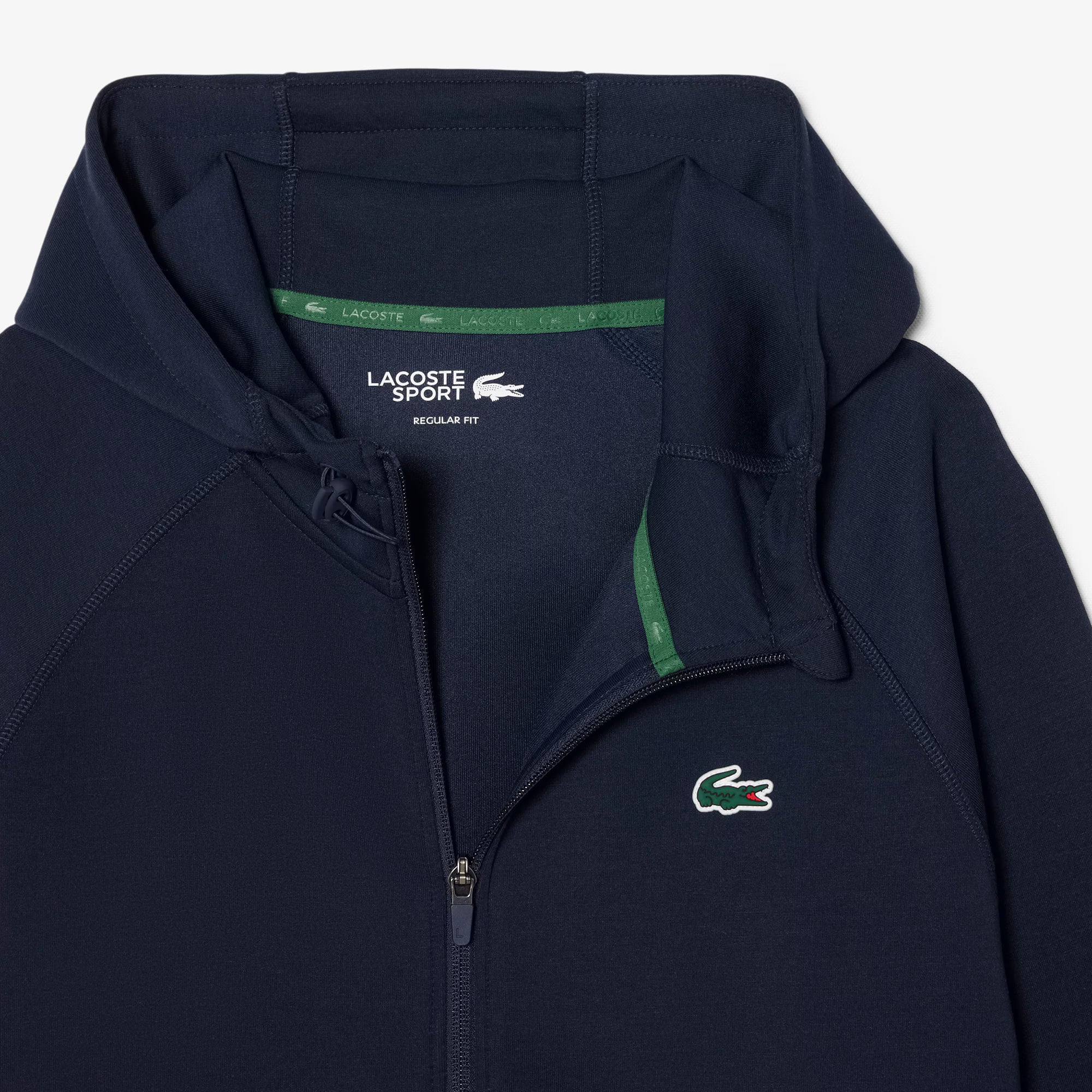 Felpa sportiva elasticizzata LACOSTE SH0152 166 con cappuccio e zip, dettagli in tessuto morbido e comodo.
