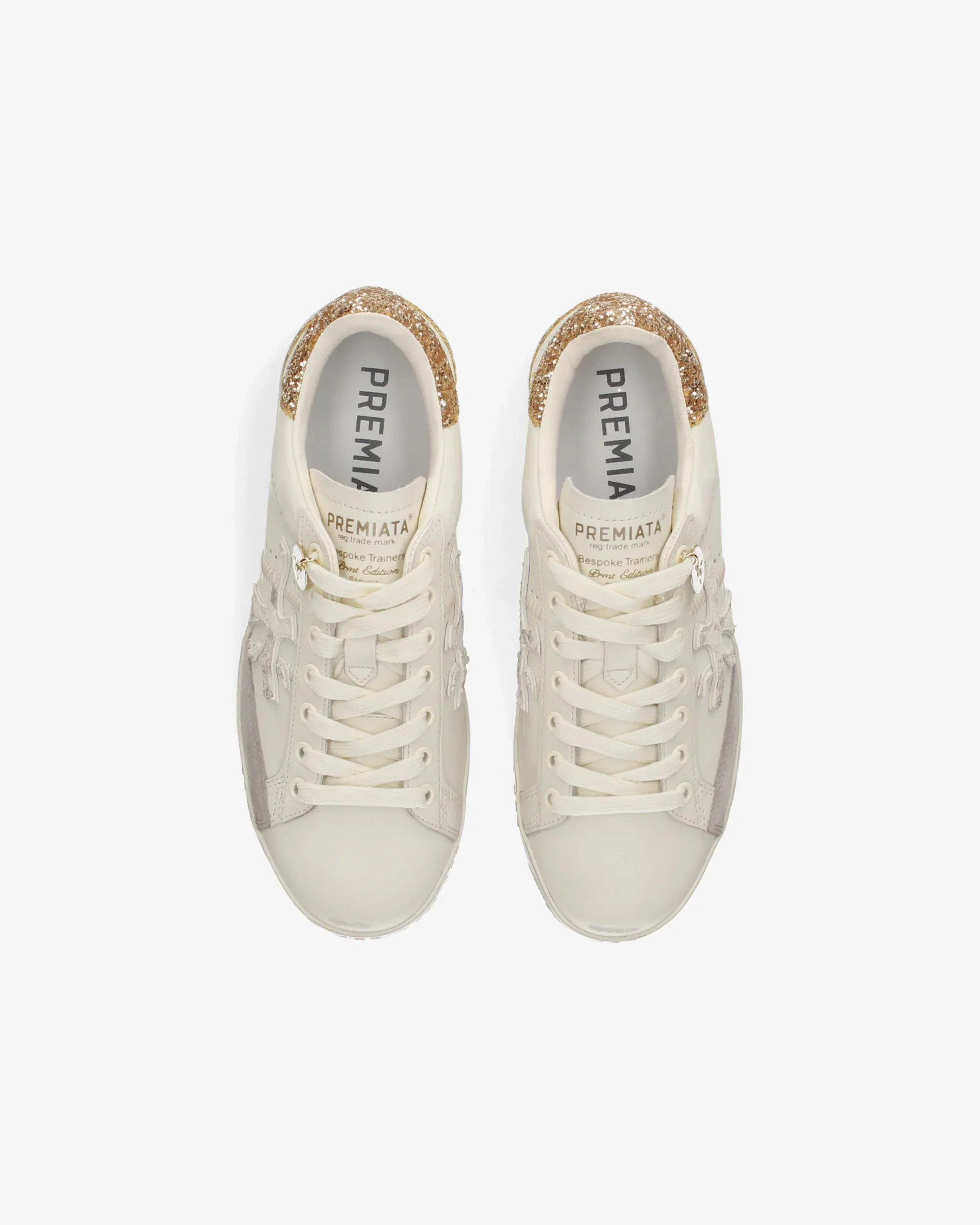 Sneakers donna bianche Premiata con dettagli glitter oro sul tallone, vista dall'alto