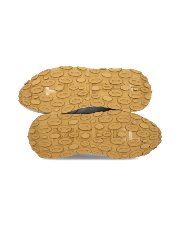 Suole scarpe uomo con motivo ovale in gomma beige, viste dall'alto, calzature moda
