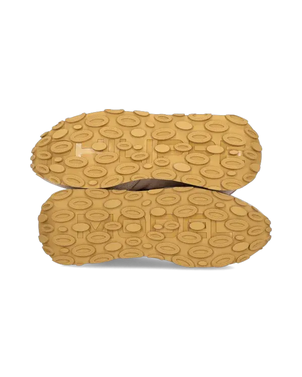 Suole scarpe casual uomo, gomma beige con motivo ovale antiscivolo, vista dal basso