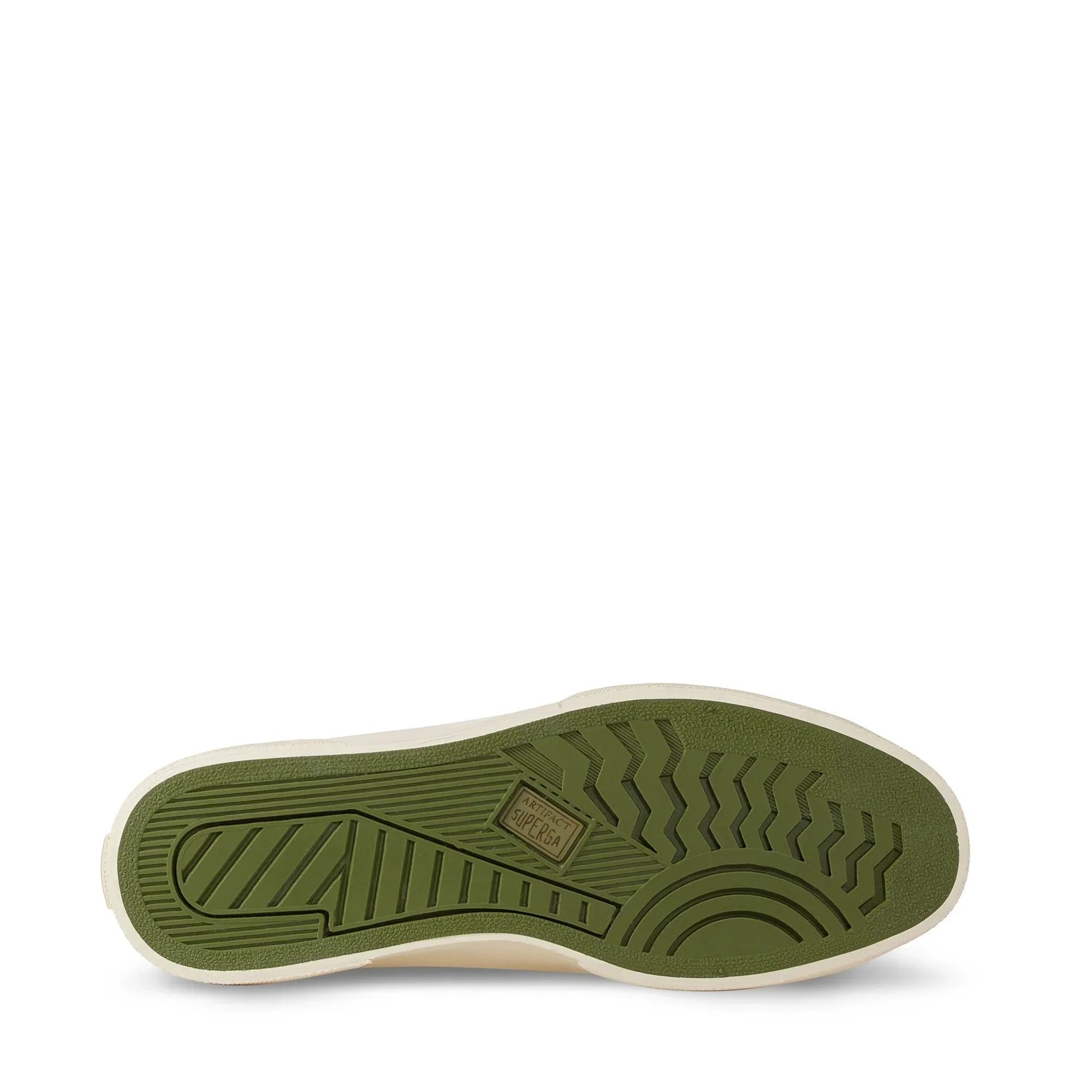Suola scarpa uomo verde con dettagli antiscivolo, vista dal basso, calzature moda