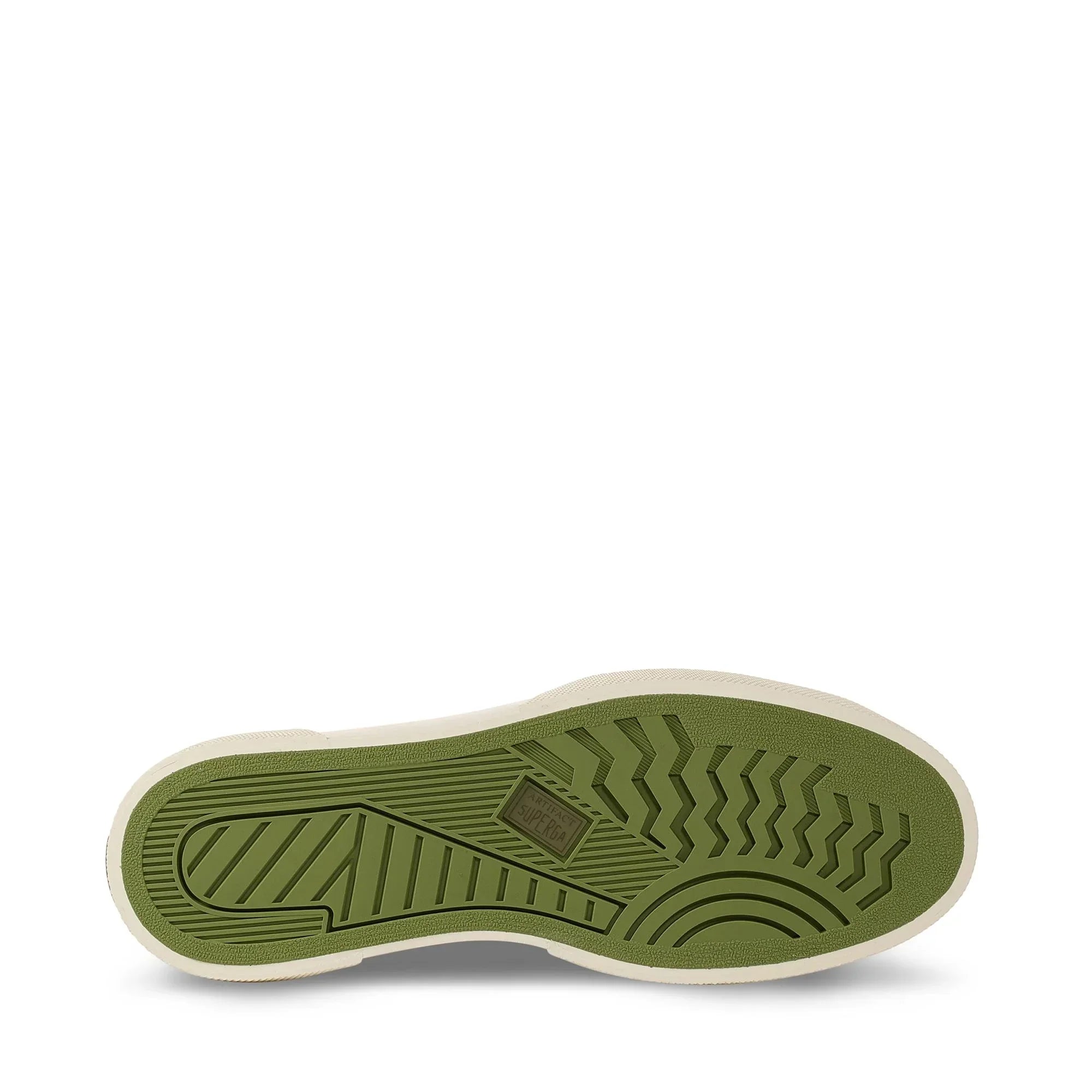 Suola scarpa verde con motivo antiscivolo, dettaglio calzature moda uomo donna