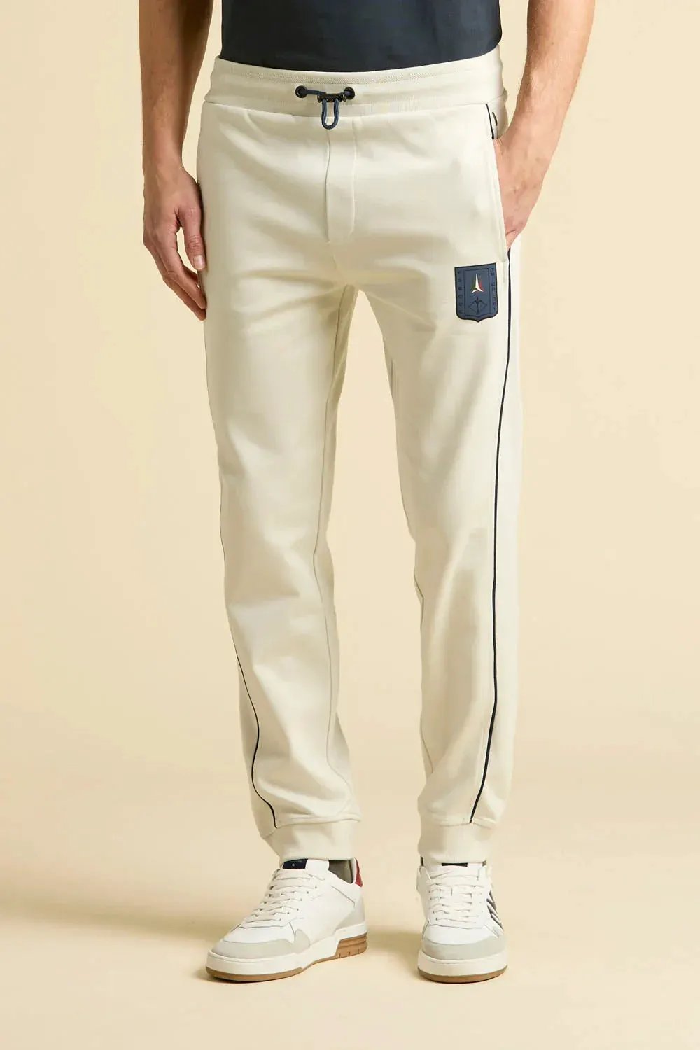 Pantaloni tuta uomo ghiaccio con patch laterale, dettagli piping e coulisse in vita