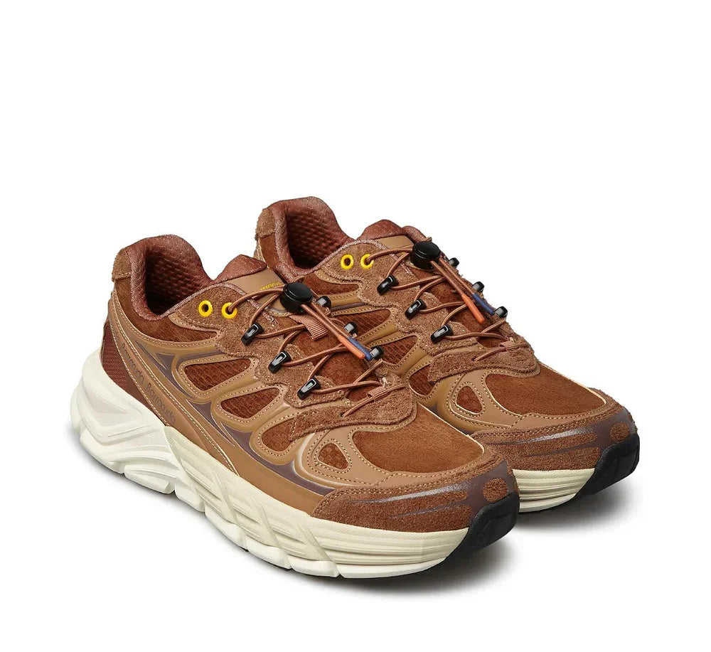 Sneaker uomo in suede cuoio, dettagli gialli, suola bianca spessa, stile sportivo