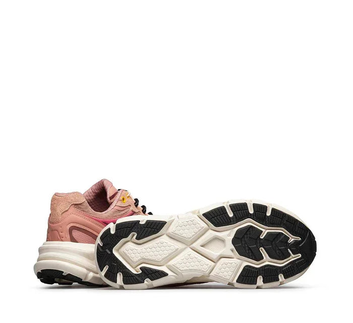 Sneaker uomo rosa con suola bianca e nera, design sportivo e dettagli a contrasto