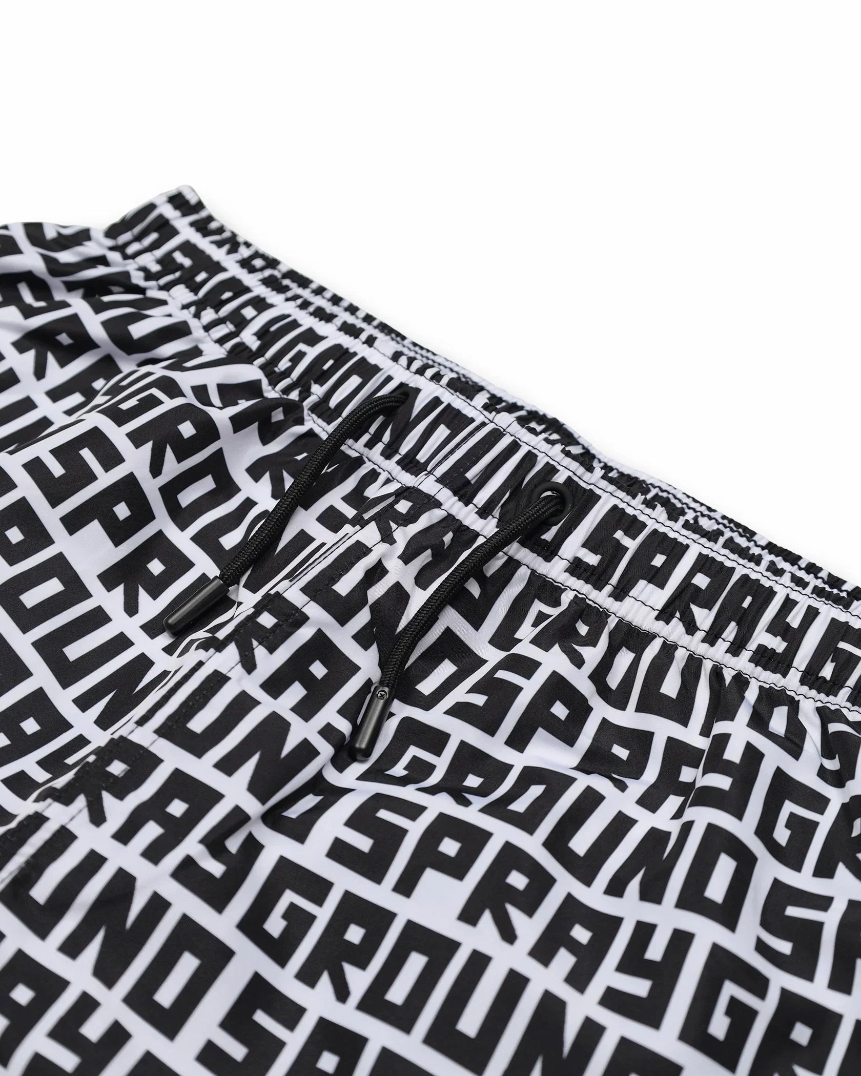 Pantaloncini uomo bianchi con stampa nera SPRAYGROUND, elastico e coulisse, moda streetwear.