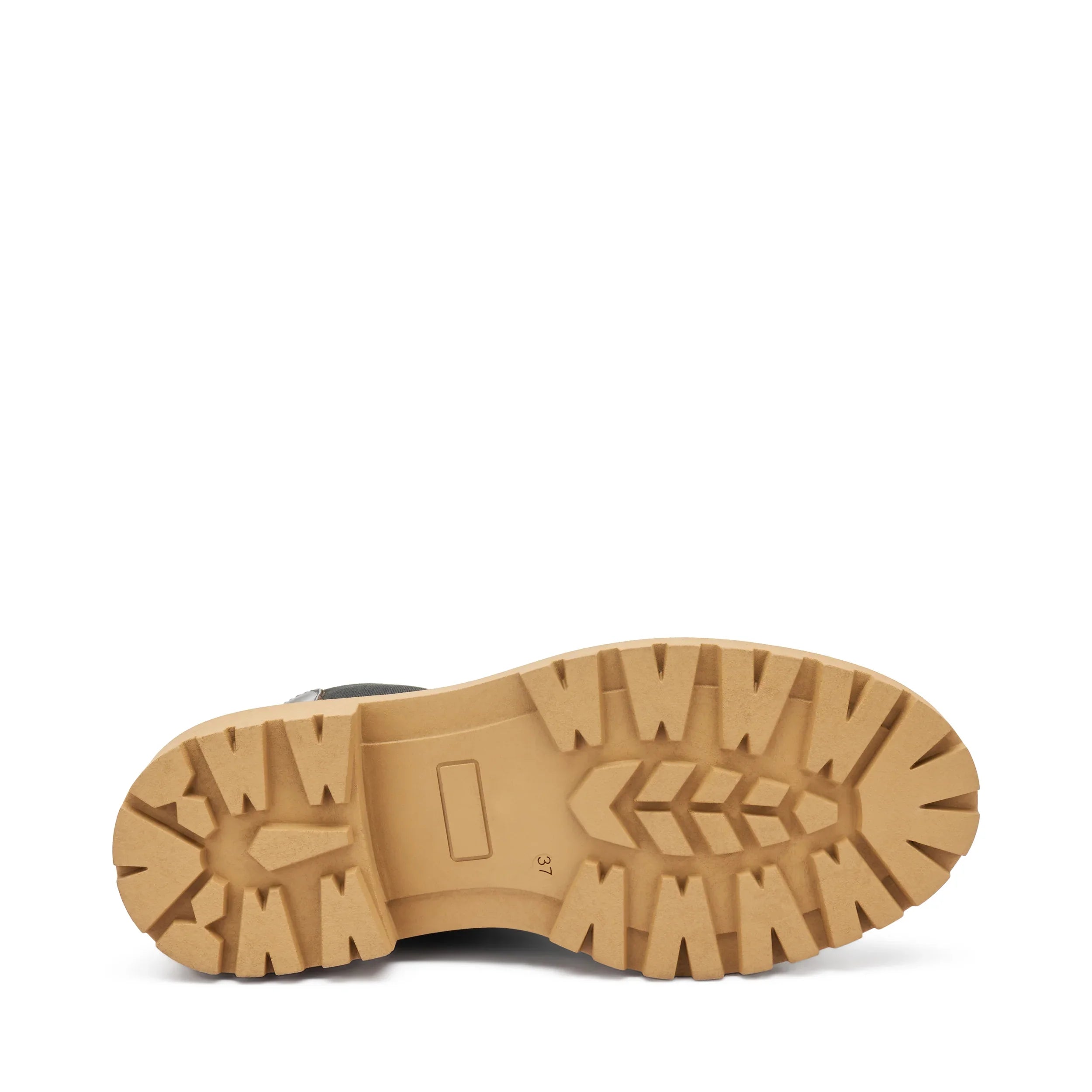 Suola carrarmato scarpa donna in pelle marrone, dettaglio fondo antiscivolo.
