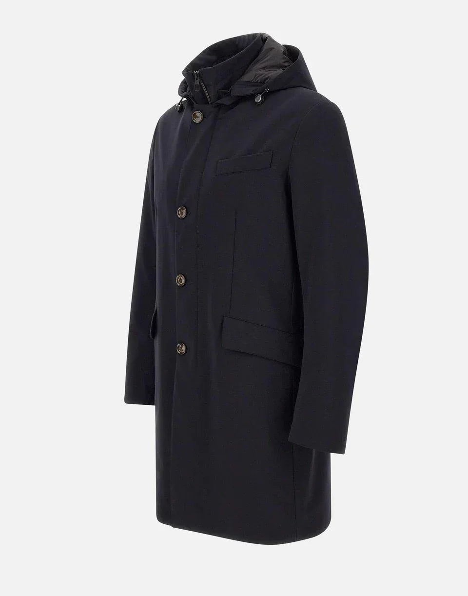 Parka blu imbottito da uomo con cappuccio e bottoni, stile elegante invernale.