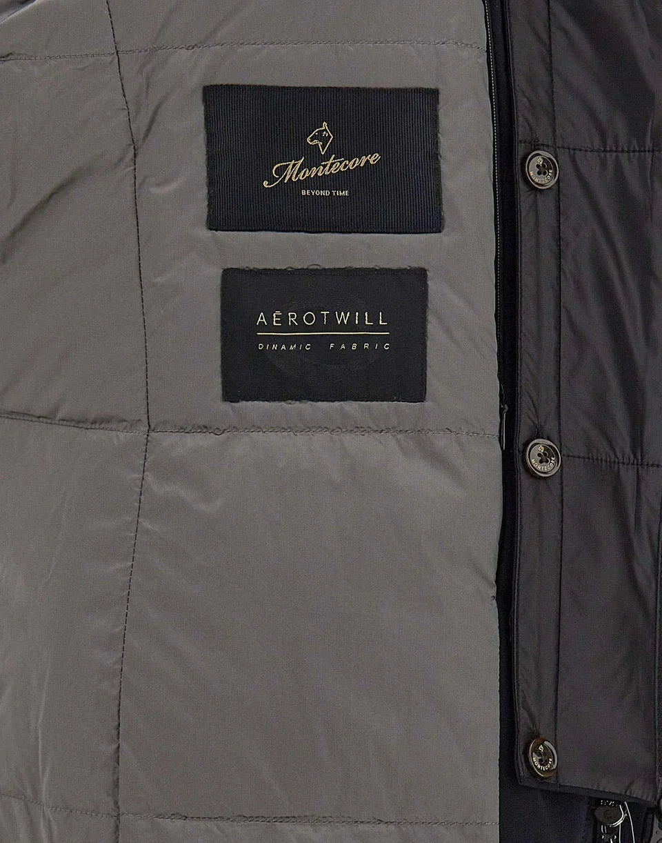 Dettaglio interno parka imbottito uomo grigio con etichette Montecore e Aerotwill in evidenza