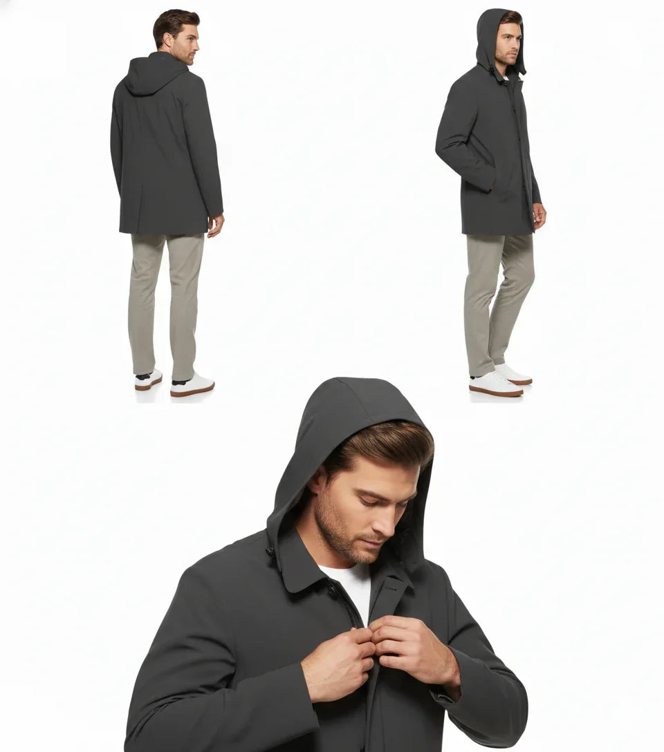 Trench uomo grigio con cappuccio, vestibilità moderna, dettagli minimal, su sfondo bianco.