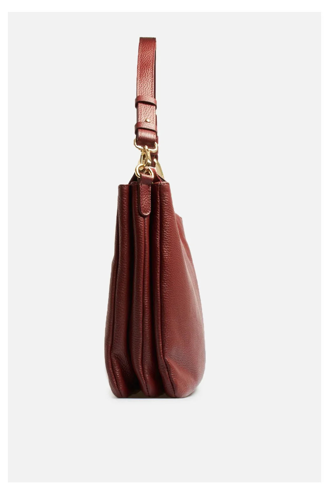 Borsa shopping in pelle martellata rosso carminio con tracolla e dettagli dorati