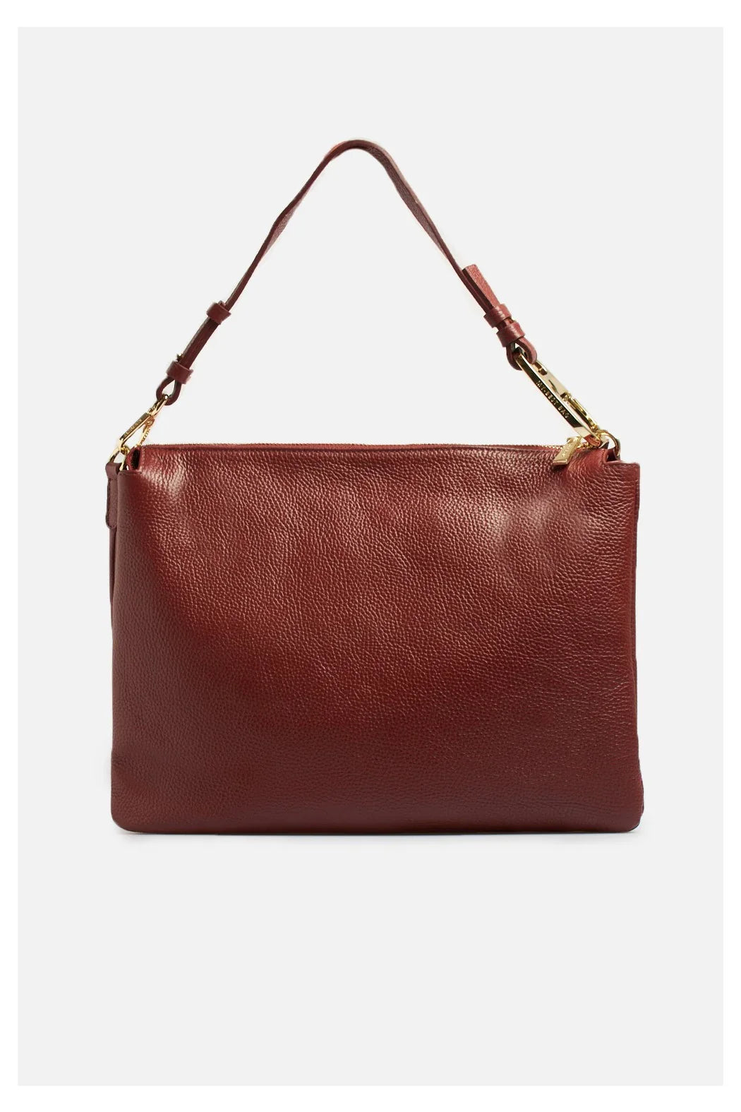 Borsa shopping in pelle color carminio con manico regolabile e dettagli dorati, su sfondo neutro.