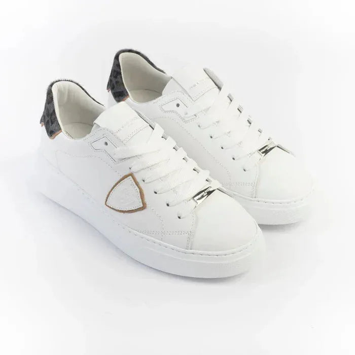 Sneakers bianche da donna con dettagli animalier blu e tallone leopardato