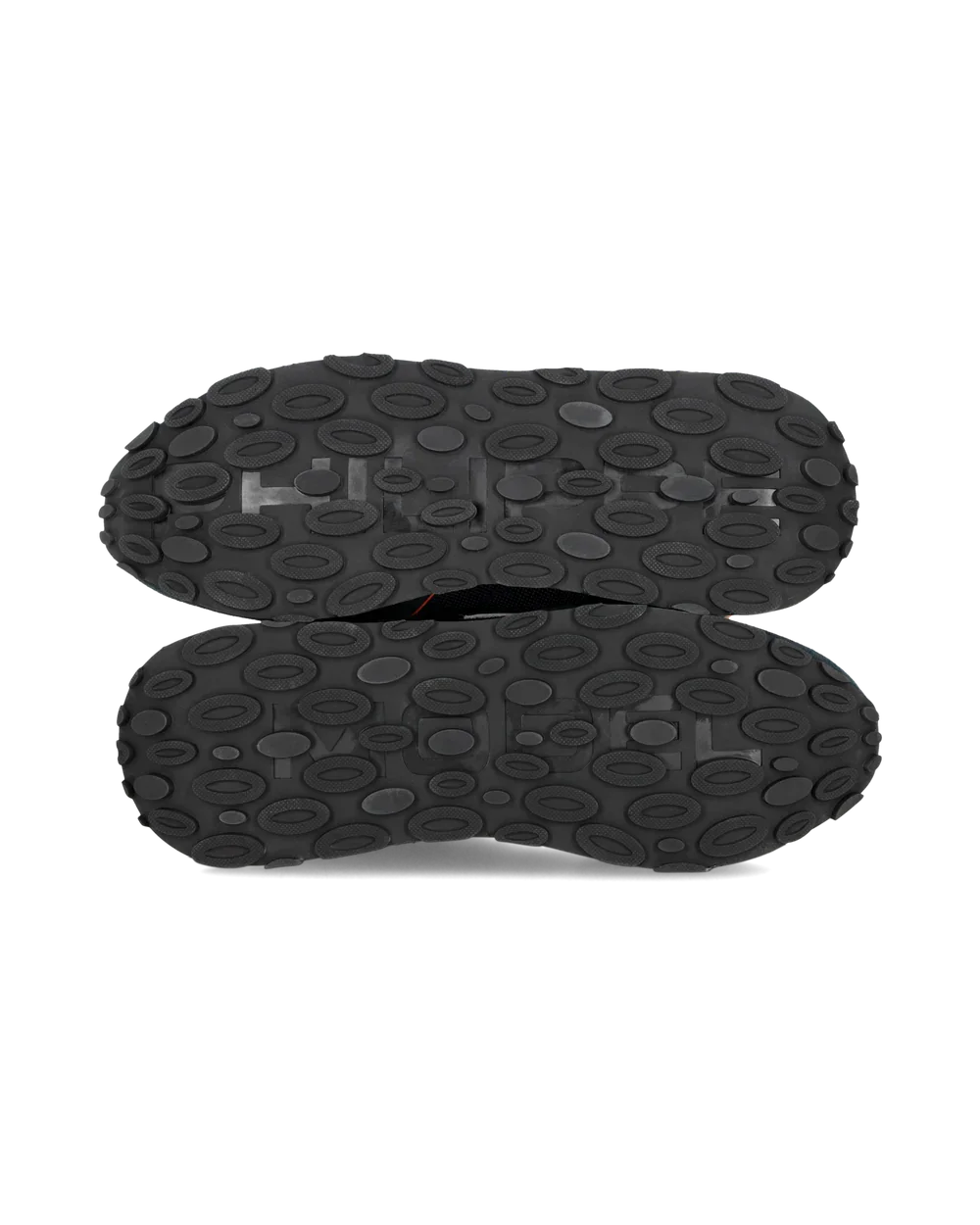 Suola sneaker nera con motivo ovale antiscivolo, vista da sotto, scarpa uomo.