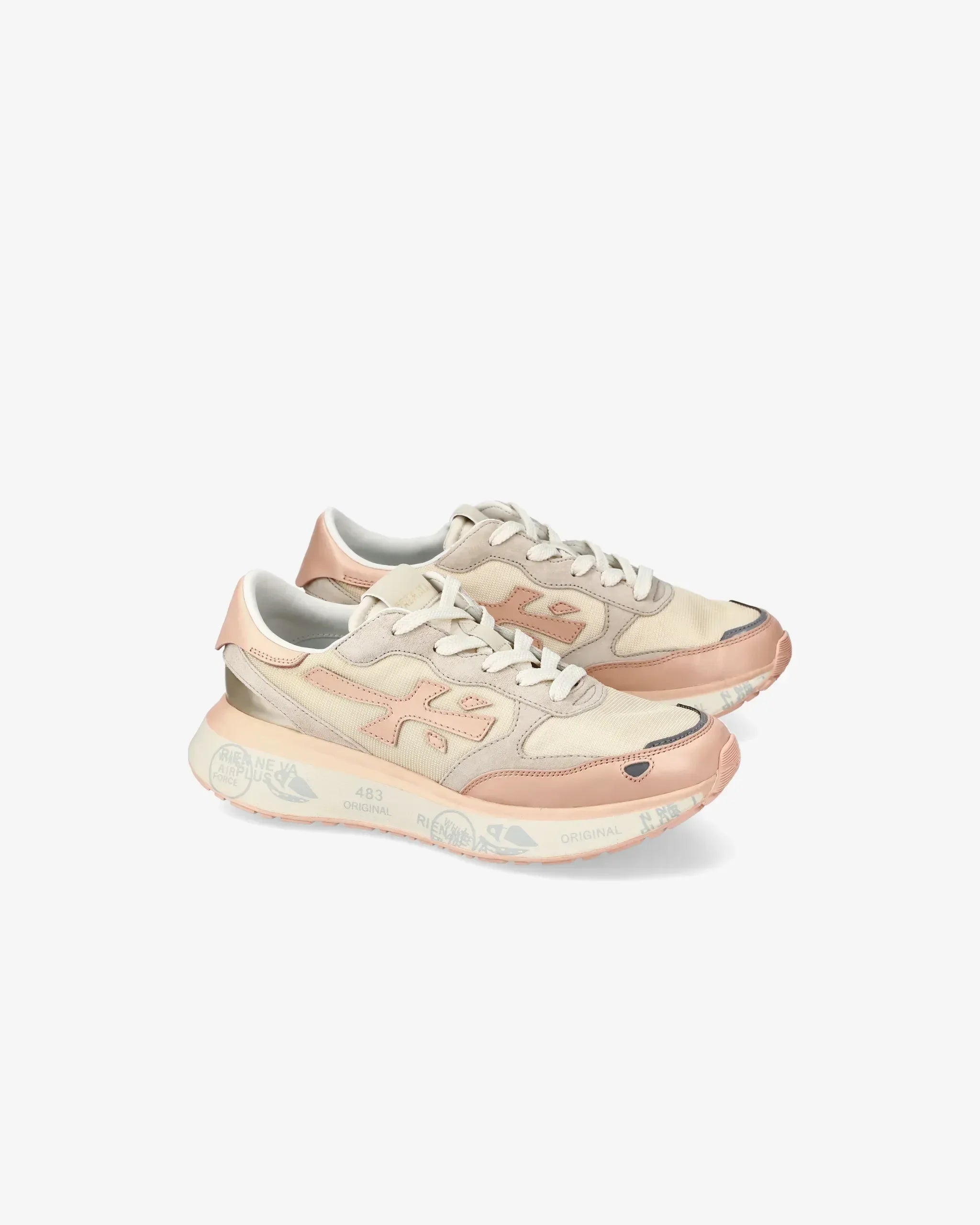 Sneakers donna beige e rosa stile casual con dettagli a contrasto e suola decorata.
