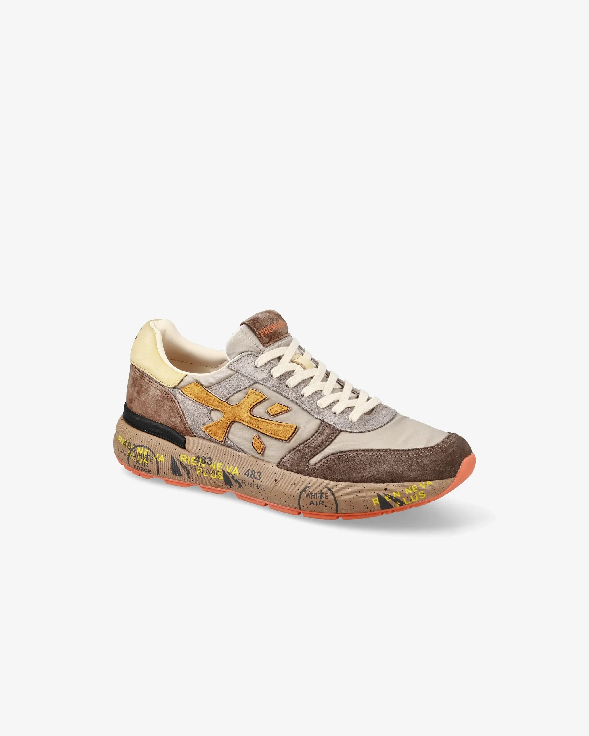 Sneaker uomo multicolore in pelle e suede con suola stampata e dettagli beige, giallo e marrone.