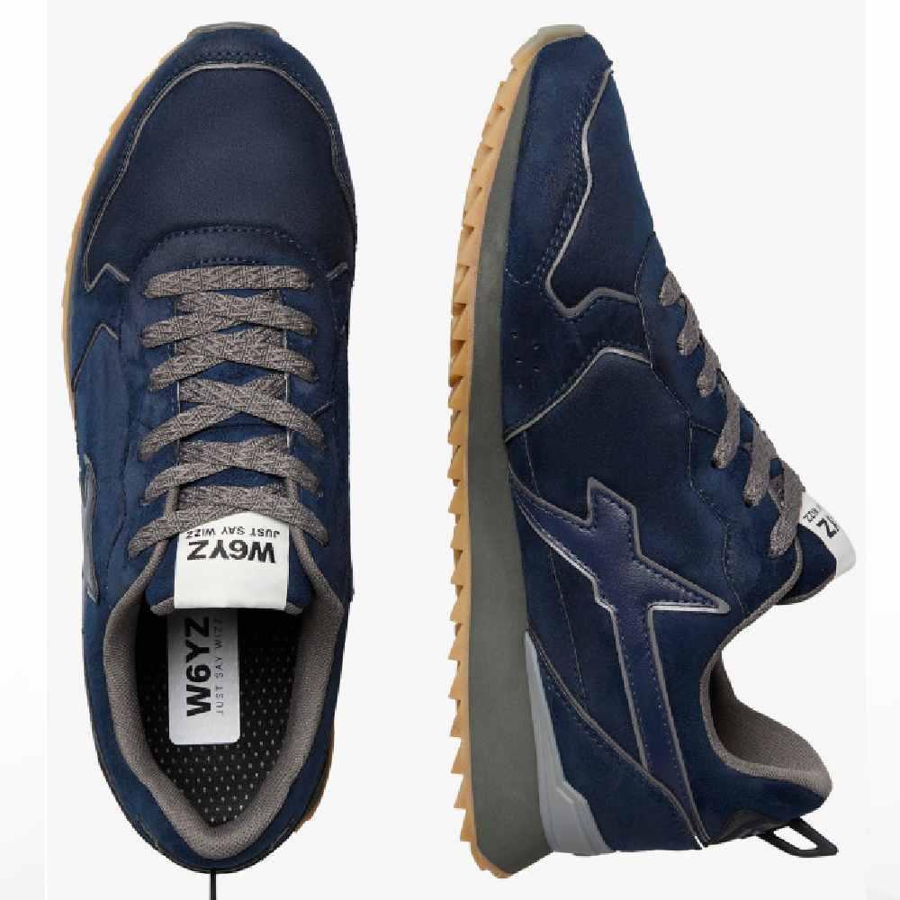 Sneaker uomo blu navy e antracite con suola beige, design sportivo, lacci grigi