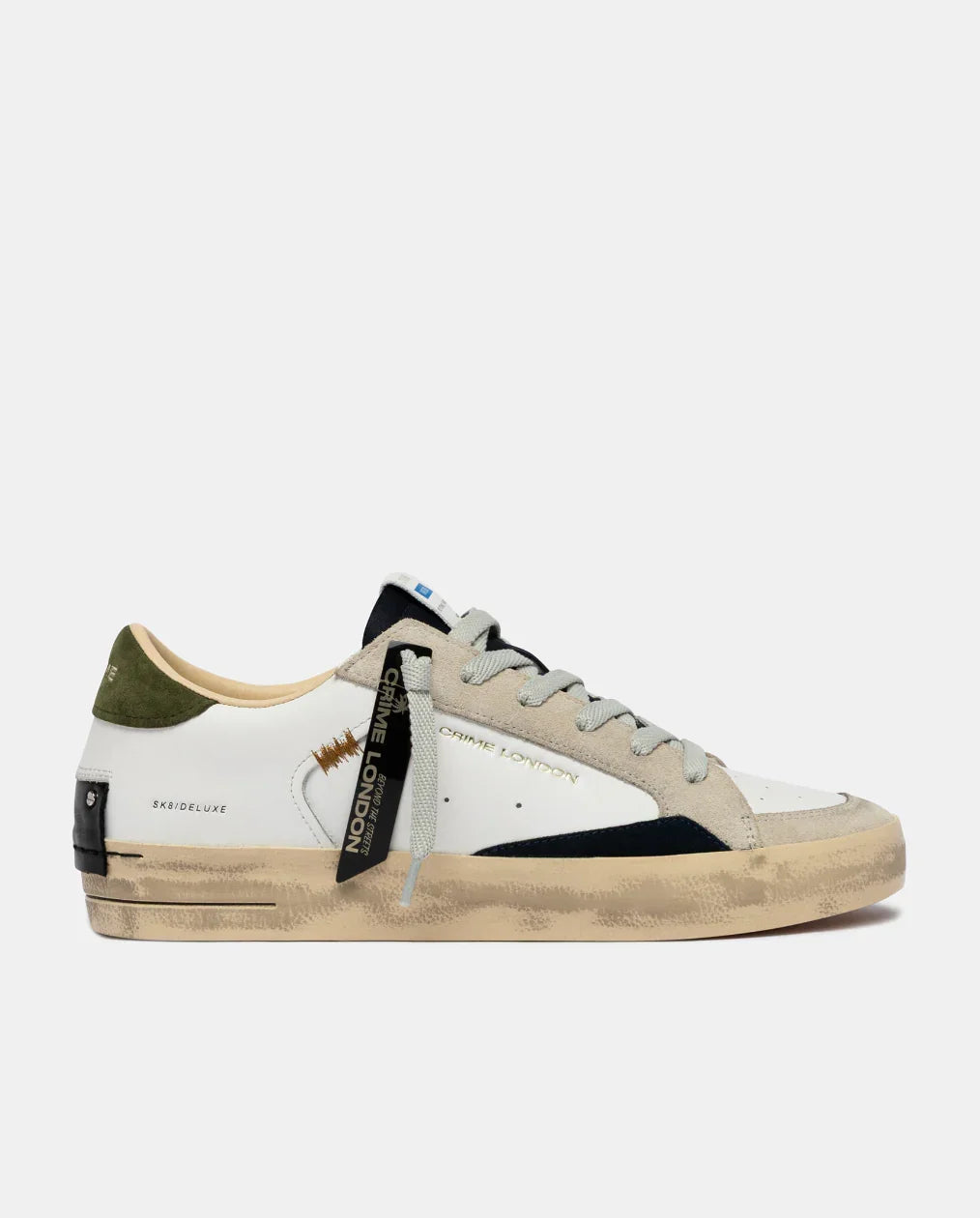 Sneaker uomo bianca con dettagli beige, verde e neri, suola vintage, design casual