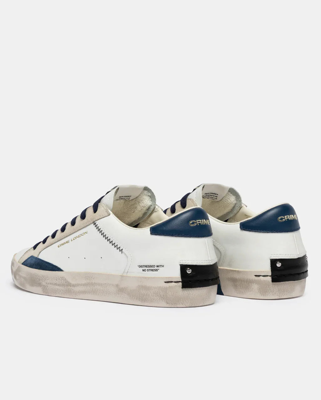 Sneakers uomo bianche con dettagli blu e suola effetto vintage, stile casual elegante.