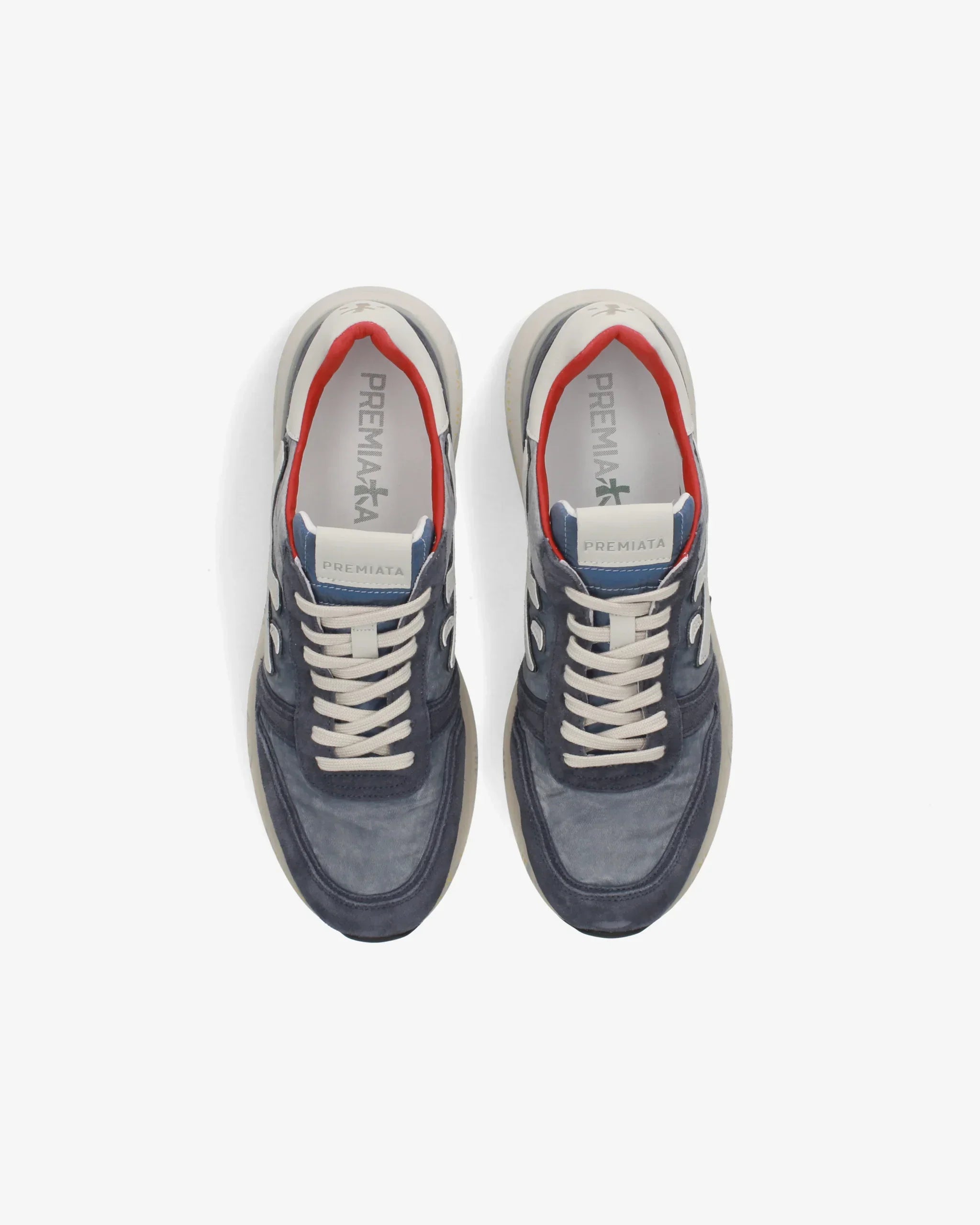 Sneakers uomo blu Premiata in pelle scamosciata con dettagli bianchi e rossi, vista dall'alto