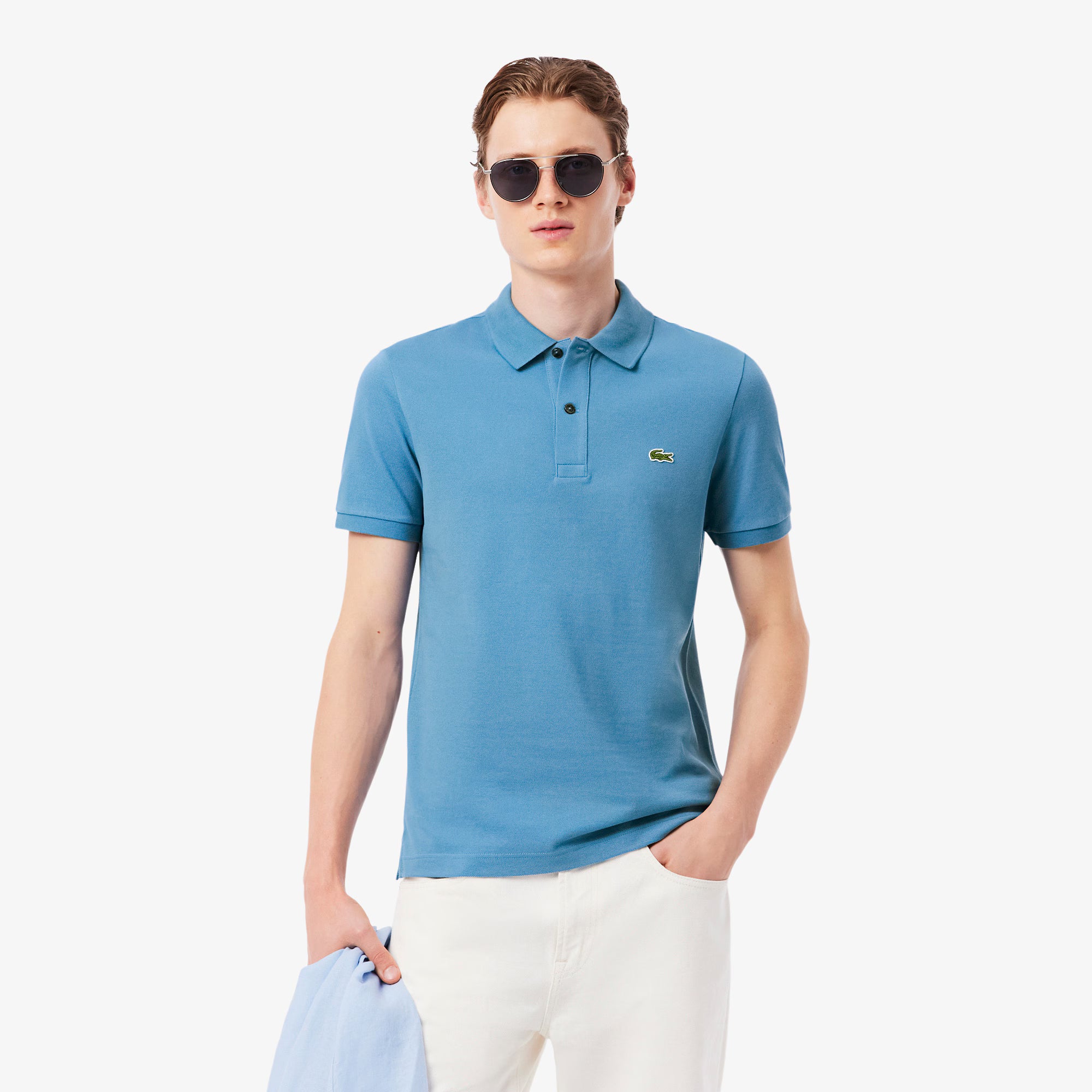 Maglietta polo slim fit LACOSTE L.12.12 in piqué color blu navy, dettaglio logo sul petto, vista frontale.