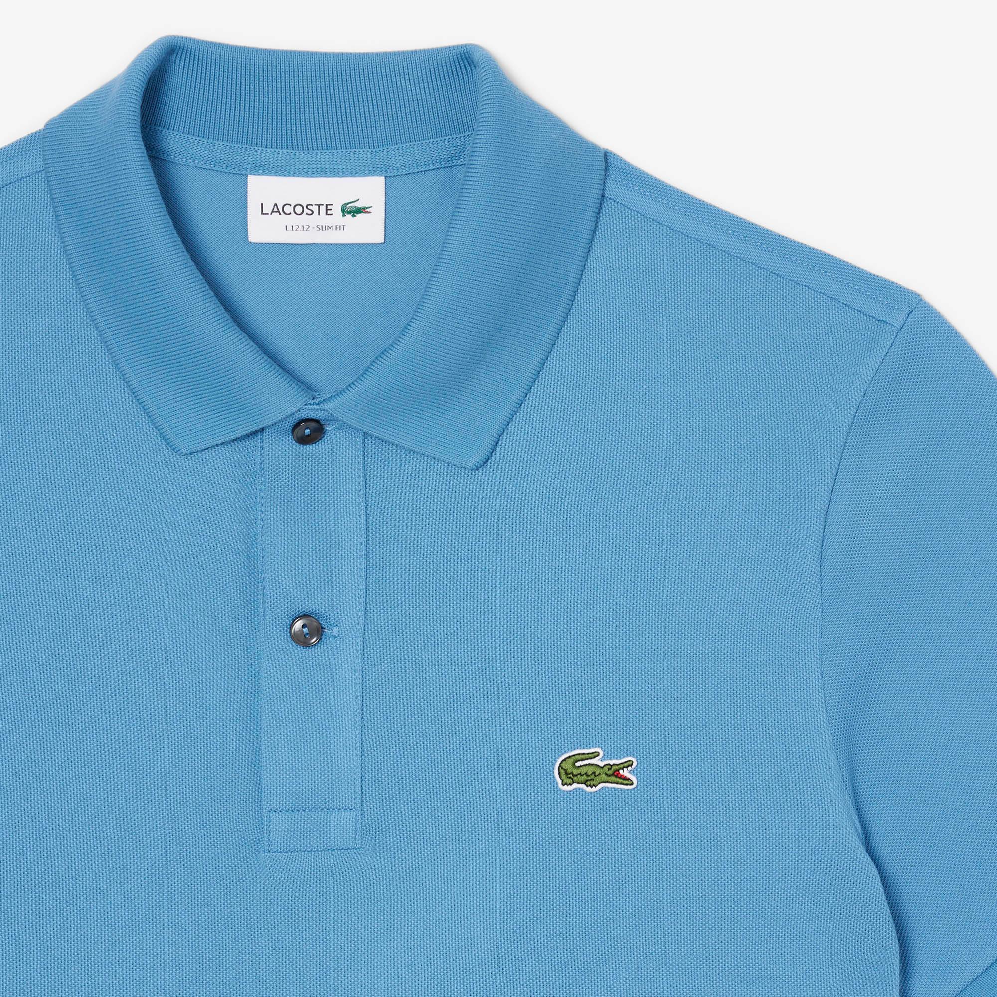 Polo uomo azzurra in cotone, maniche corte, colletto classico, logo ricamato.