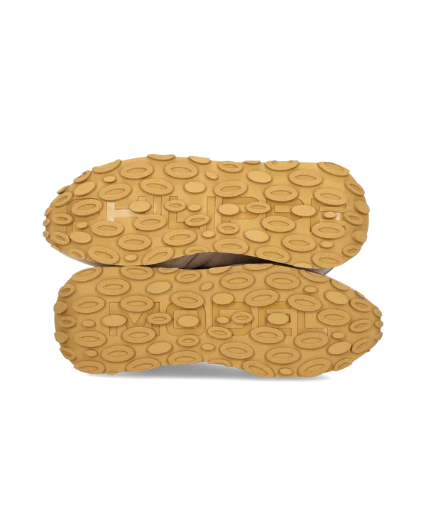 Suole scarpe casual uomo, gomma beige con motivo ovale antiscivolo, vista dal basso