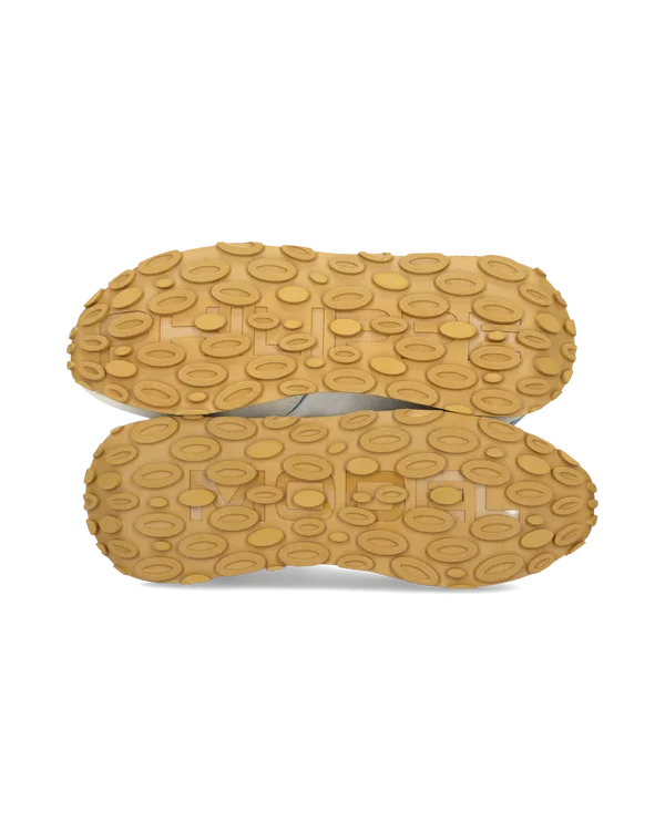 Suole scarpe sportive uomo in gomma beige con motivo ovale, vista dal basso