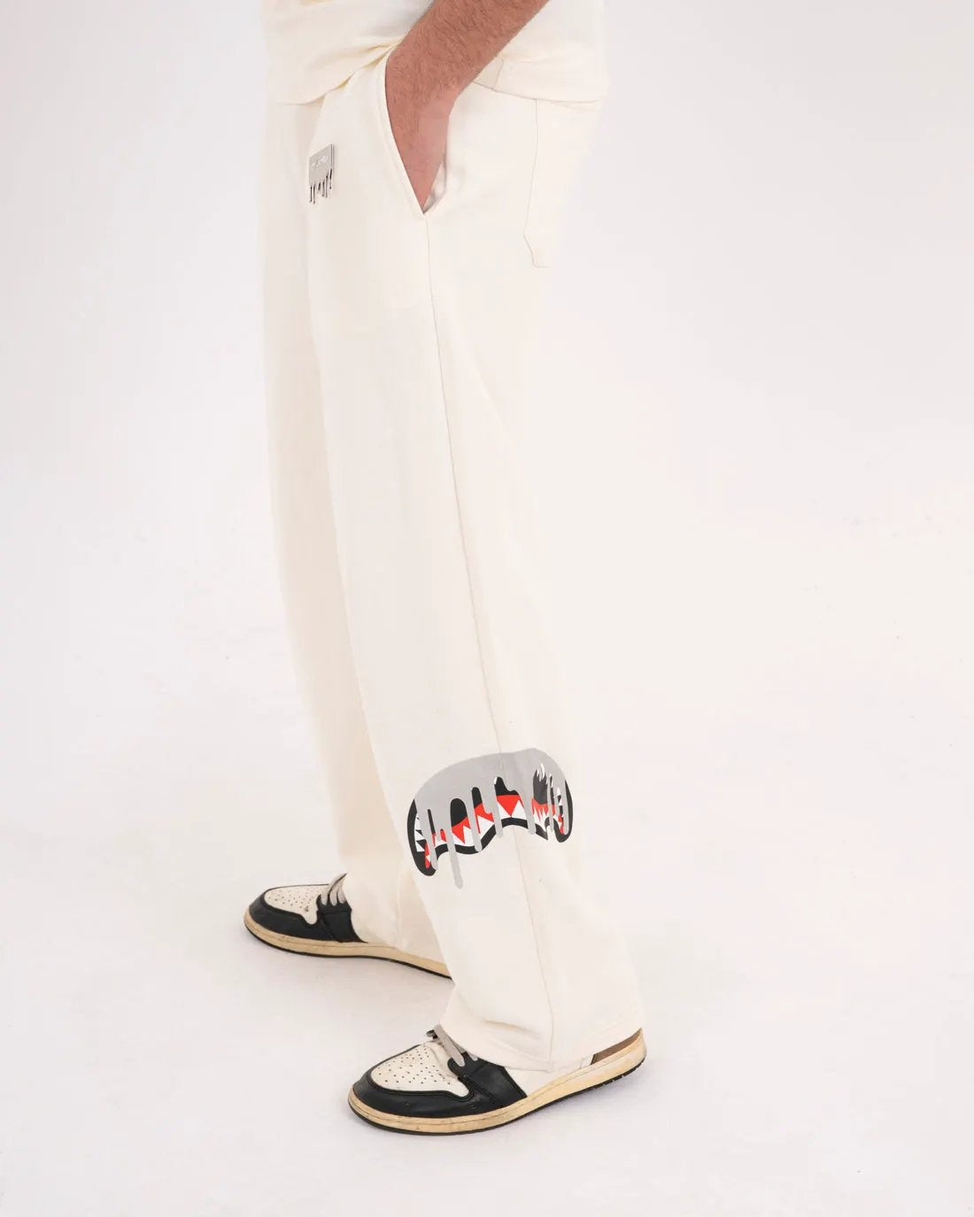 SPRAYGROUND Pantalone tuta Silver Drip Over Ivory - Vista frontale