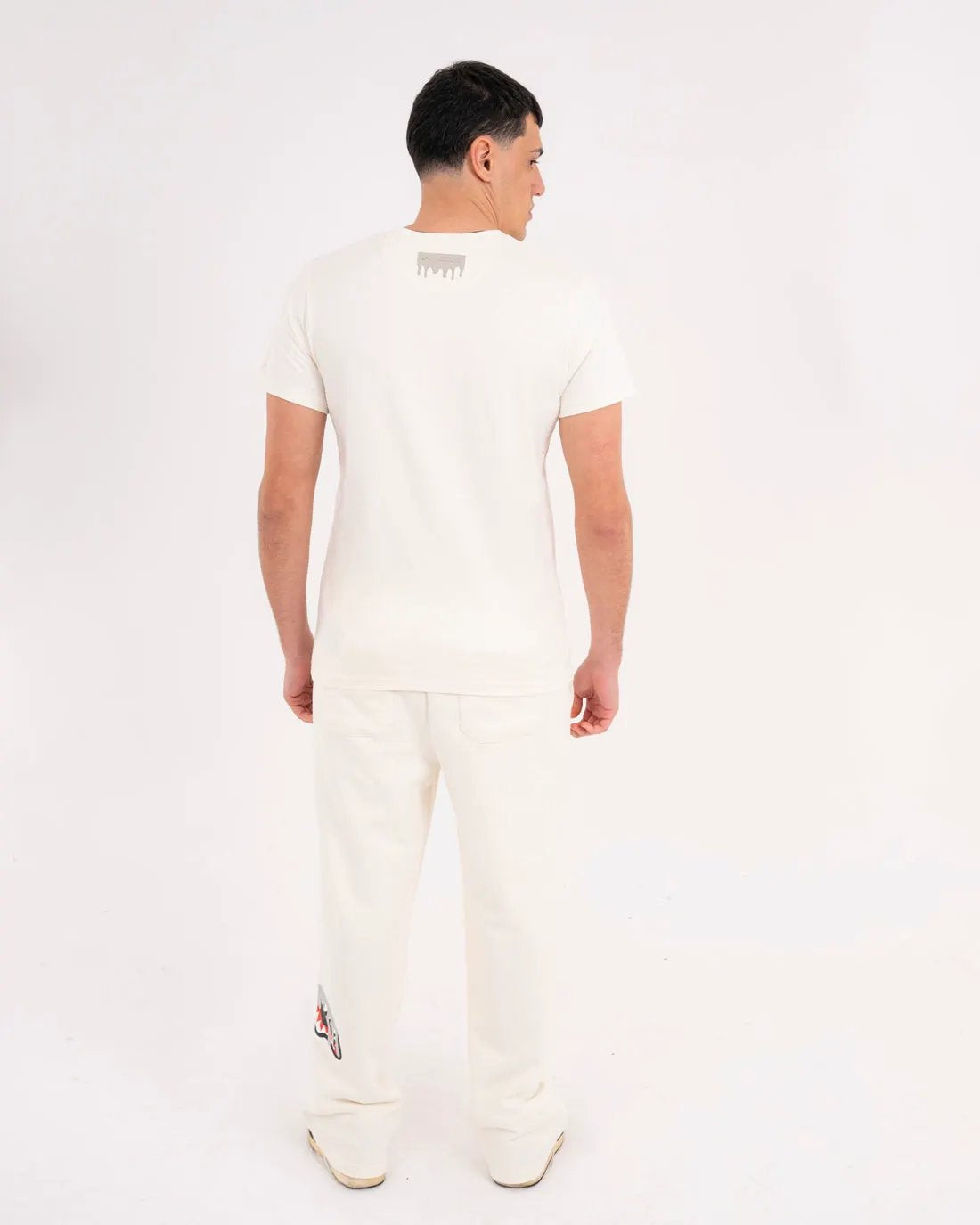 SPRAYGROUND Pantalone tuta Silver Drip Over Ivory - Vista laterale