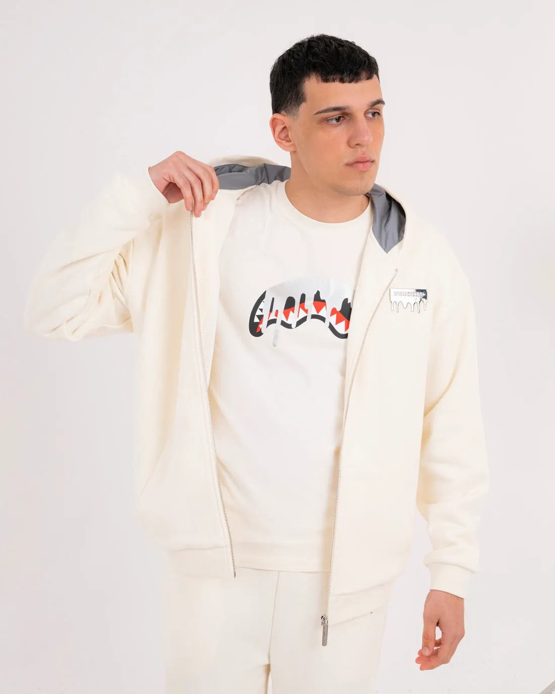 Felpa Sprayground Silver Drip Smooth Perfect Full-Zip Ivory dettaglio tasca frontale