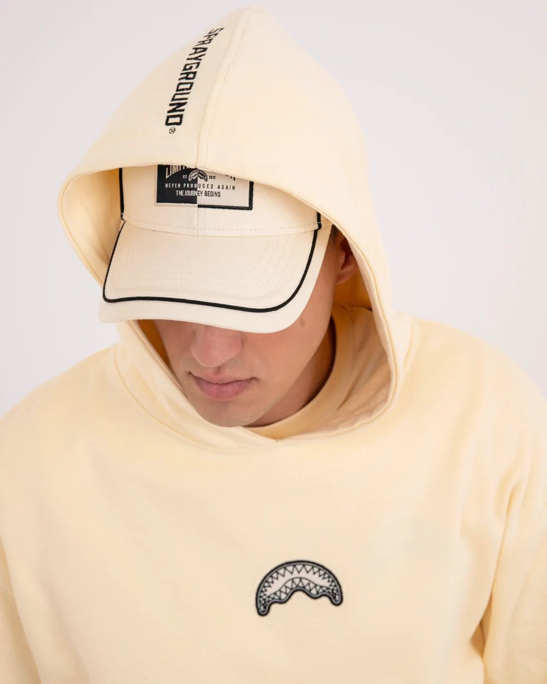 Cappellino Sprayground Pure Cap Cream vista posteriore con cinturino
