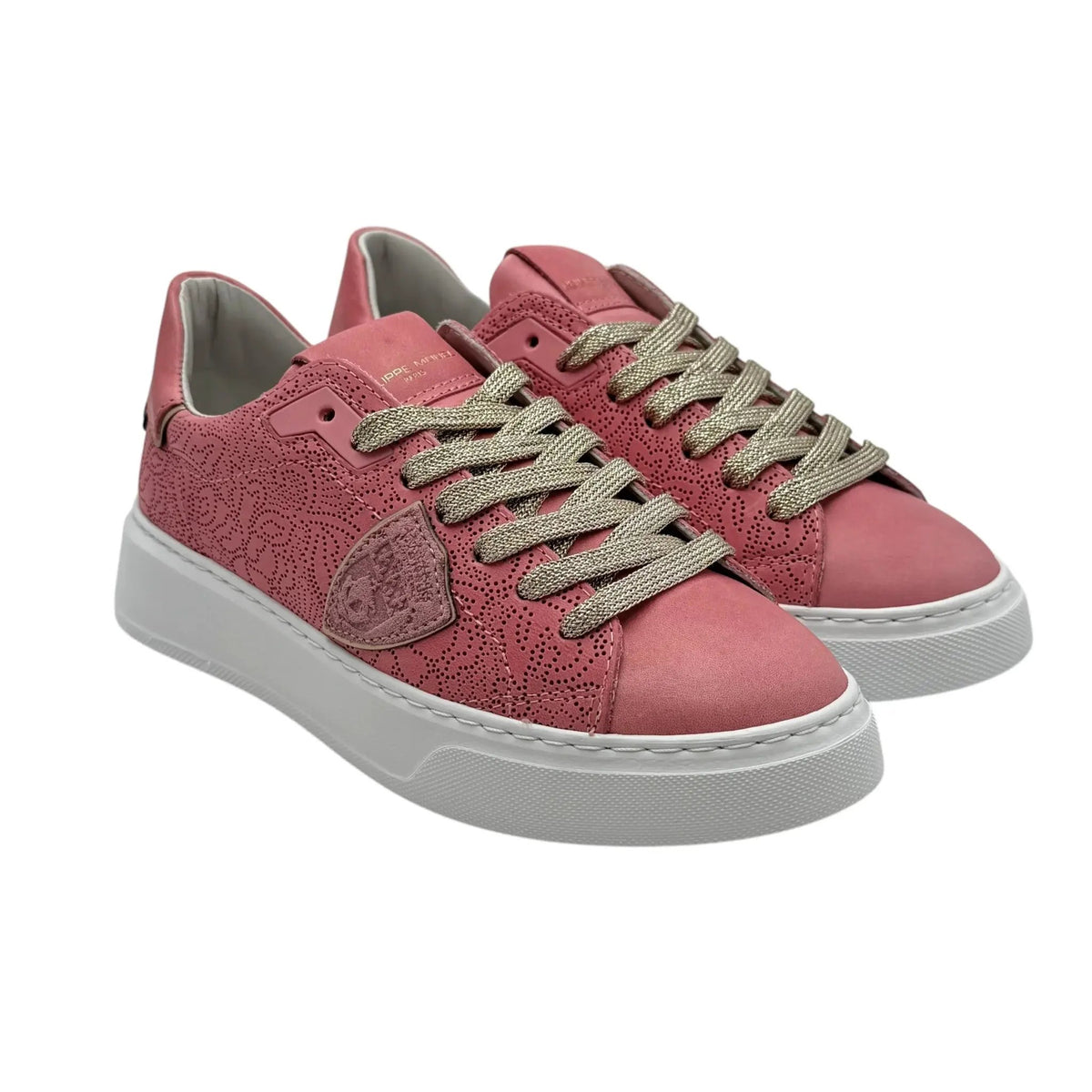 Sneakers donna rosa con tomaia traforata e suola bianca, dettaglio lacci color oro.